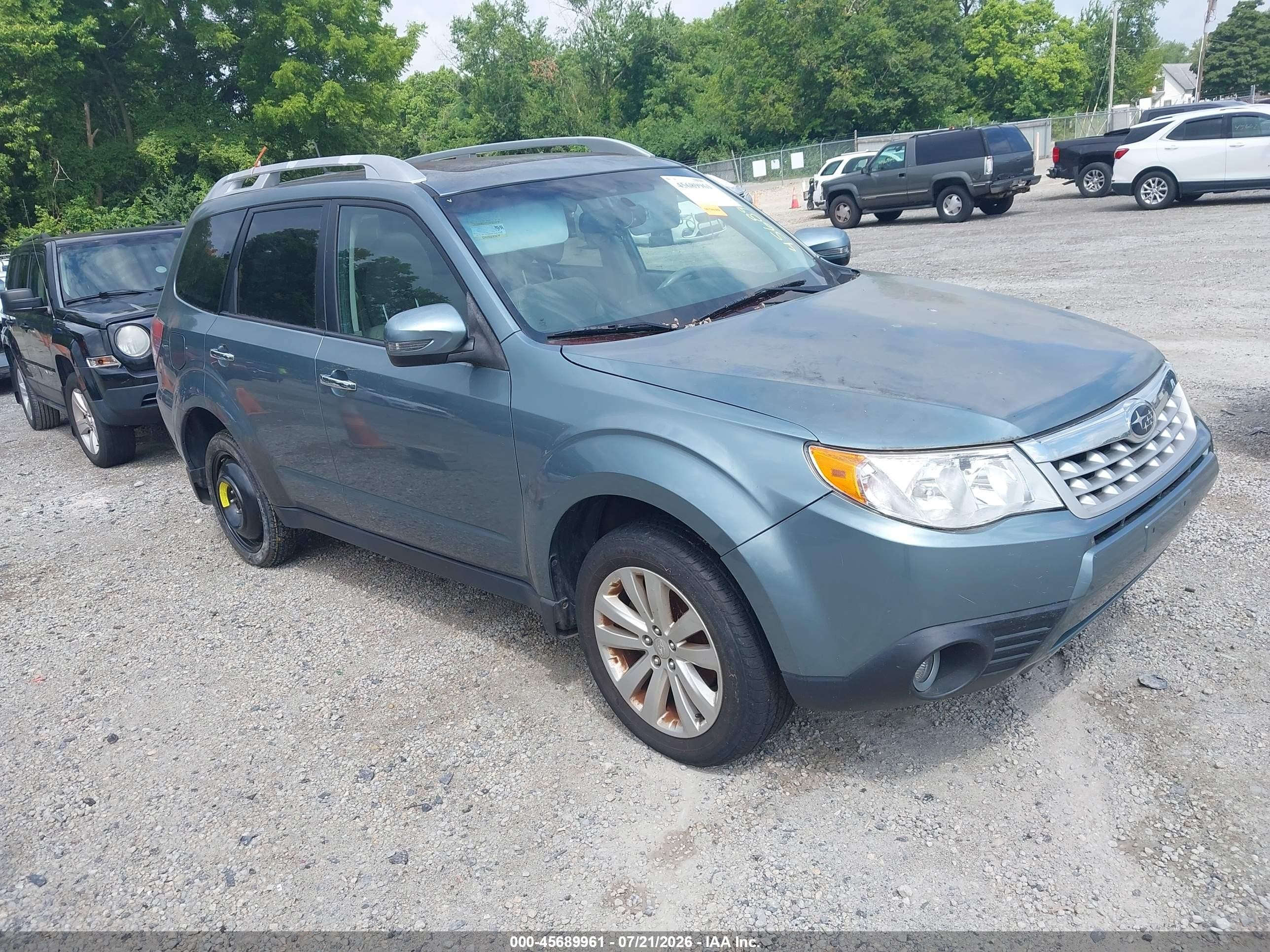2011 Subaru Forester X Touring, VIN JF2SHAGC1BH717259 — Обычный износ