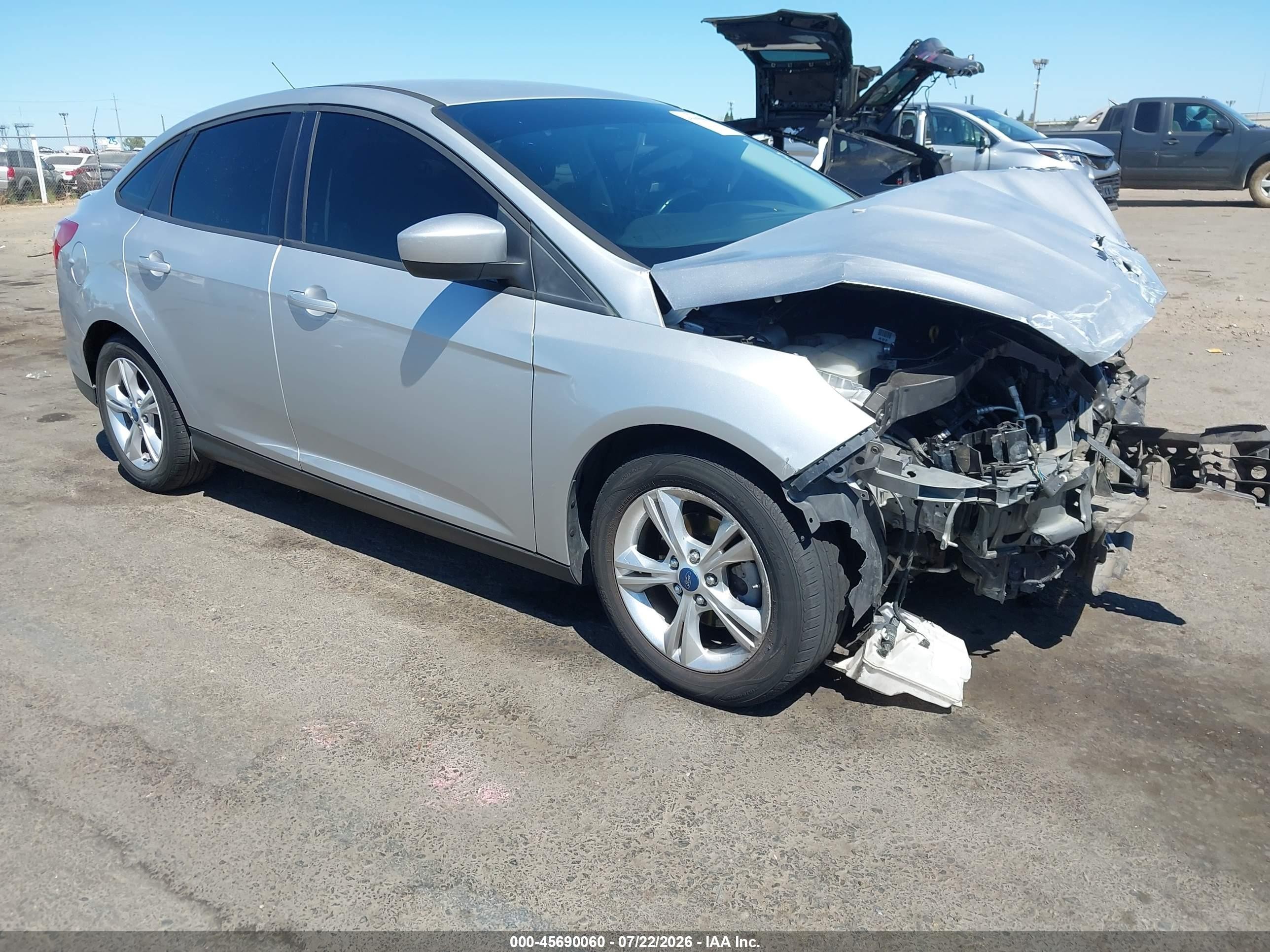 2012 Ford Focus SE, VIN 1FAHP3F23CL452848 — Front end