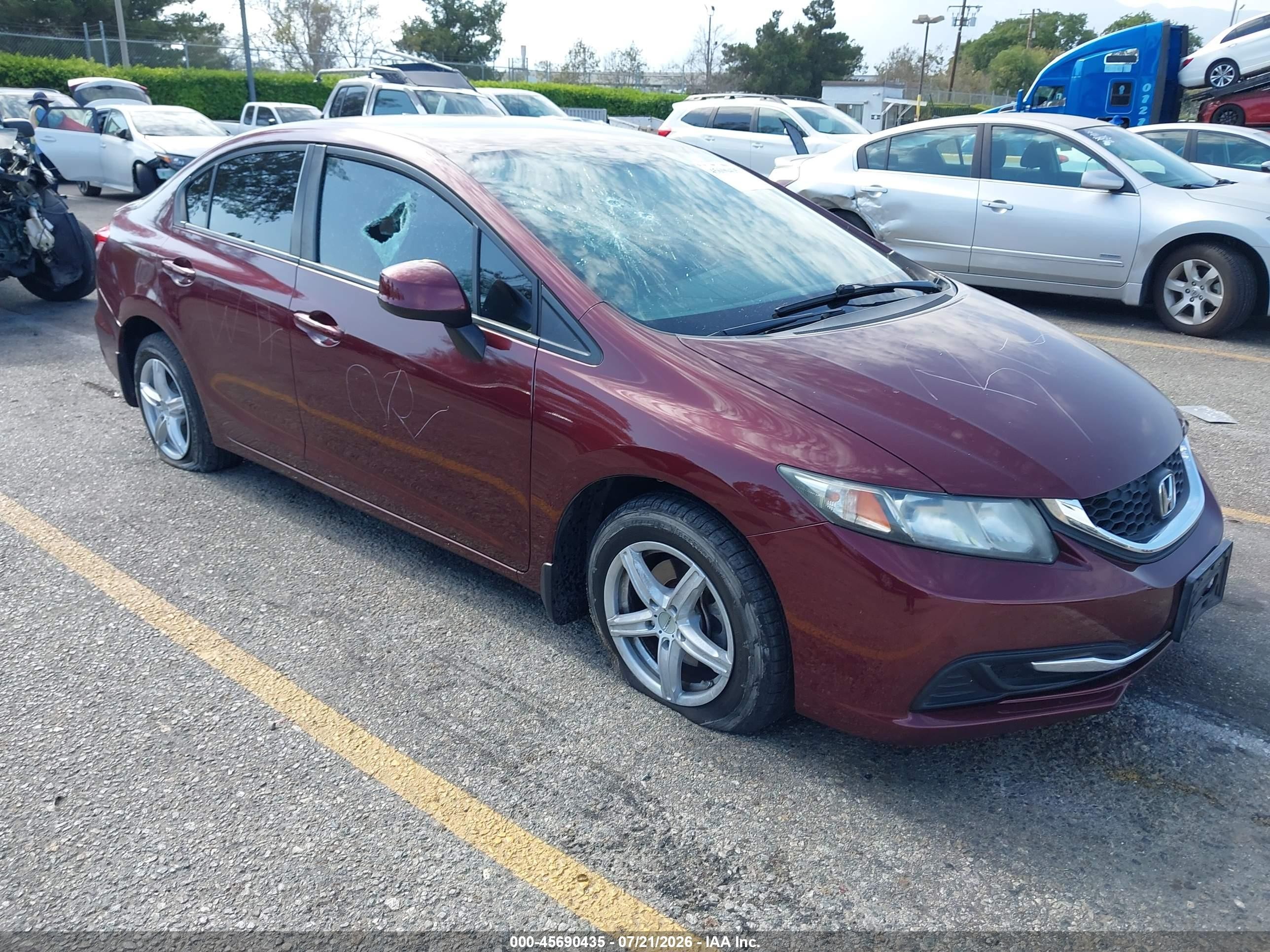 2013 Honda Civic LX, VIN 2HGFB2F53DH525706 — Vandalism
