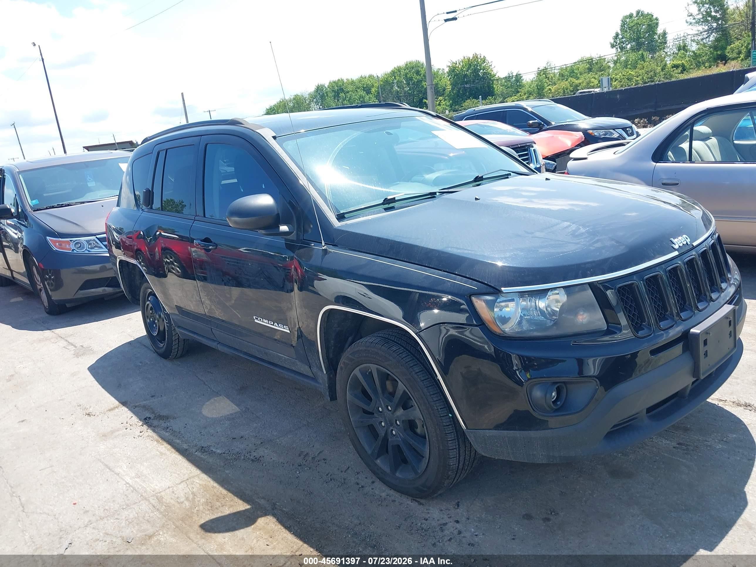 2012 Jeep Compass Latitude, VIN 1C4NJCEA0CD692344 — Rear end