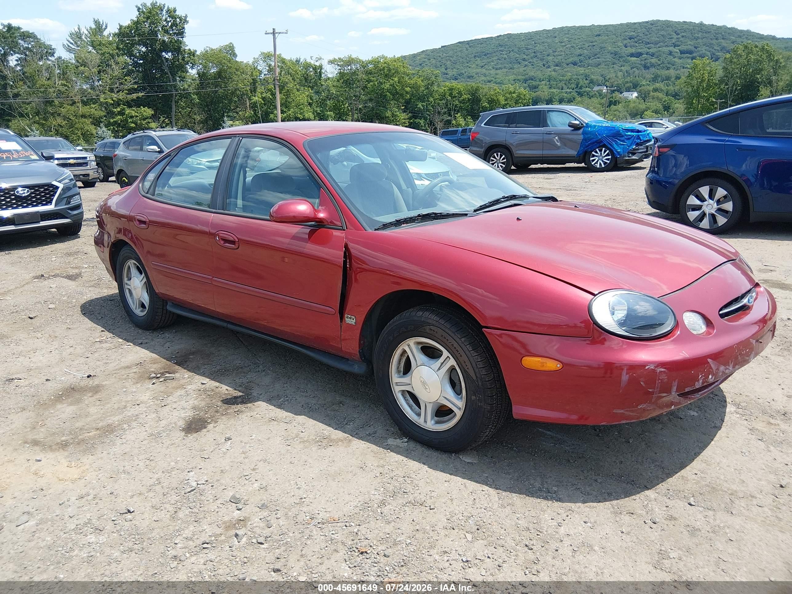 1999 Ford Taurus SE, VIN 1FAFP53S8XA131297 — Бок