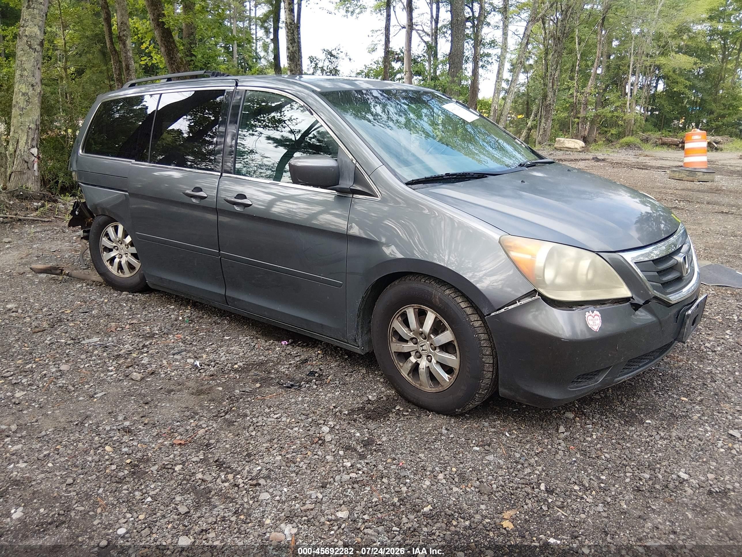 2010 Honda Odyssey EX-L, VIN 5FNRL3H6XAB101736 — Rear end