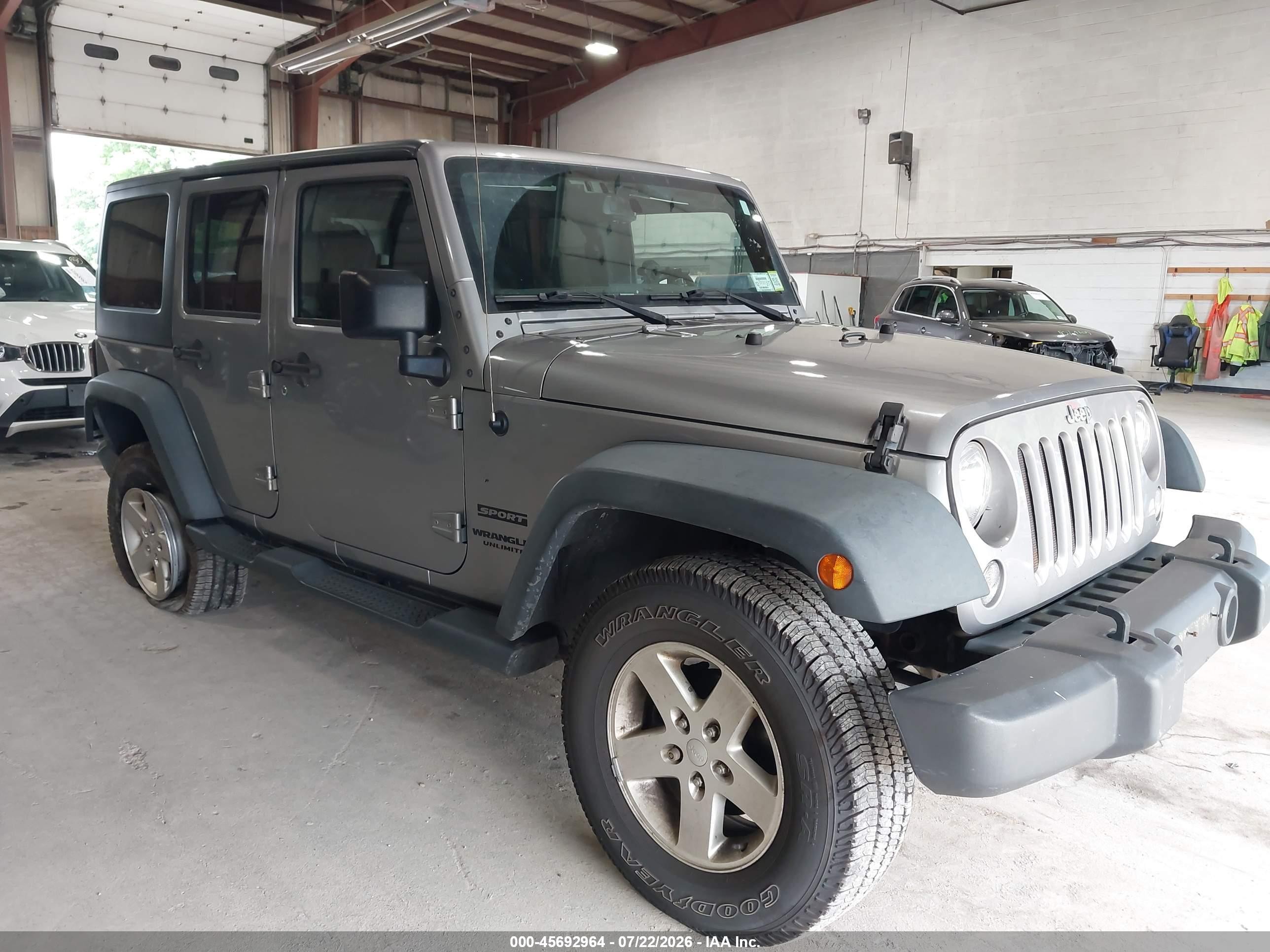 2016 Jeep Wrangler Unlimited Sport, VIN 1C4BJWDG9GL319454 — Зад