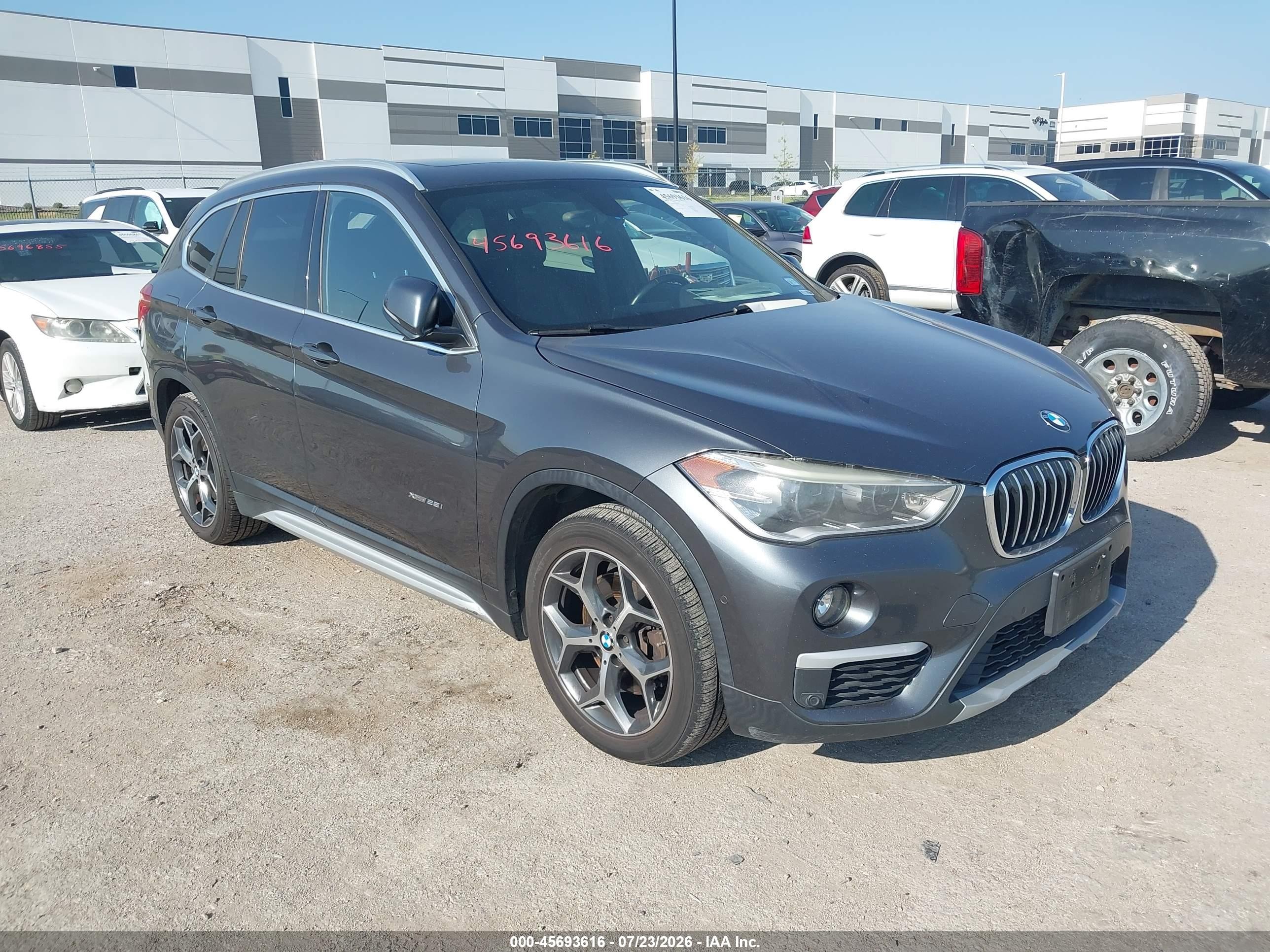 2016 BMW X1 xDrive28i, VIN WBXHT3C34GP887849 — Rear end
