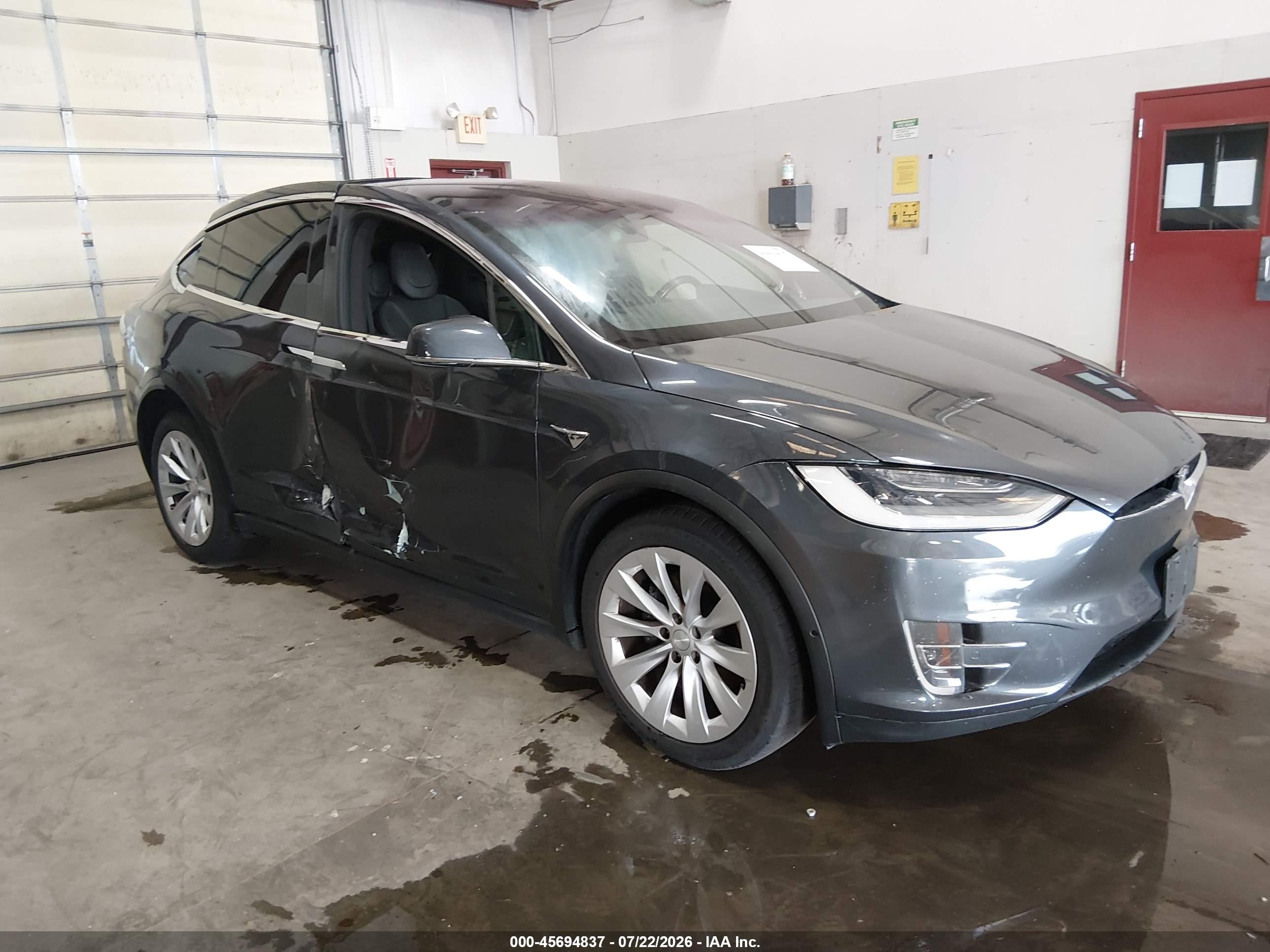 2016 Tesla Model X 70D, VIN 5YJXCDE24GF025910 — Side