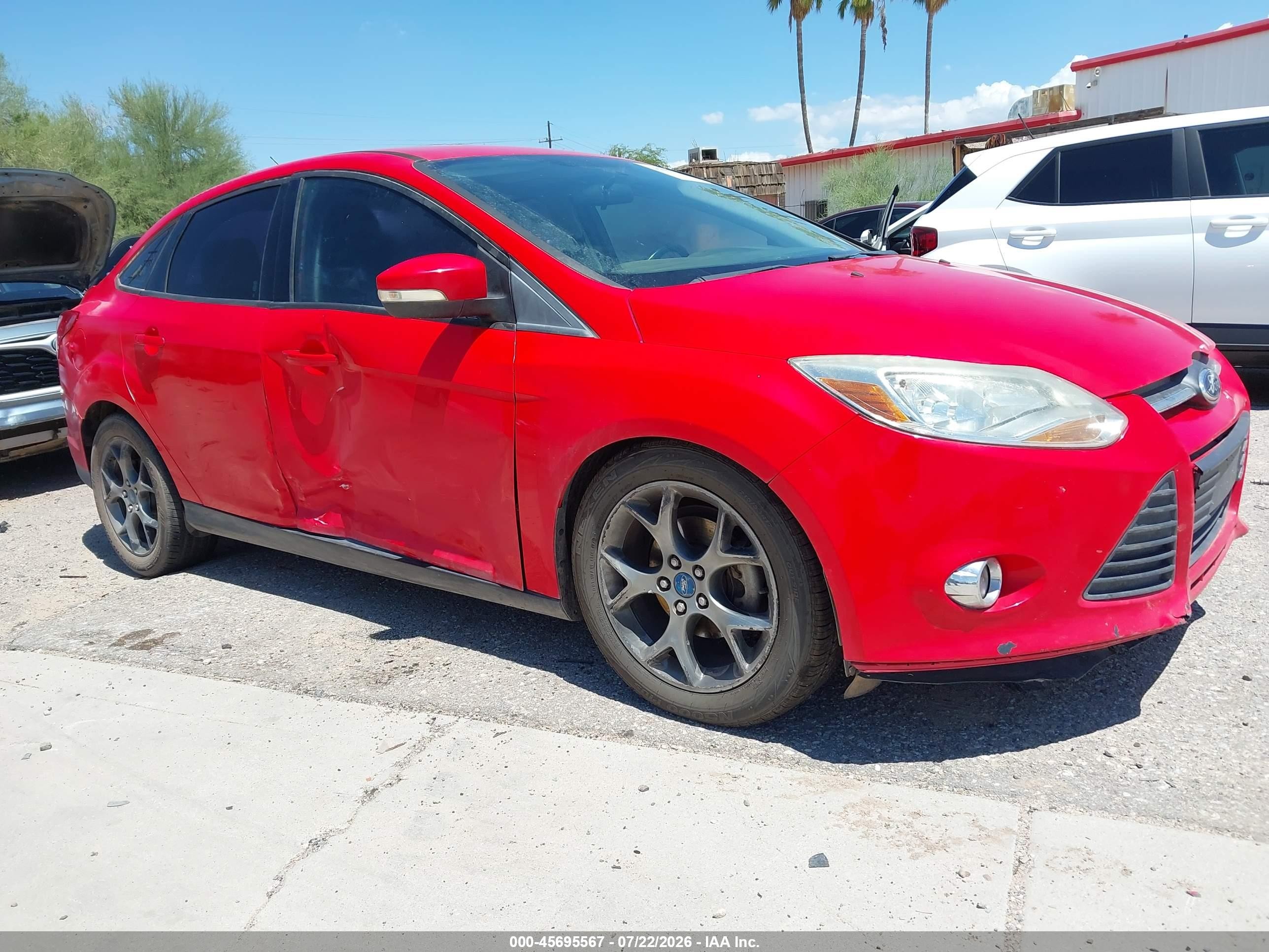 2013 Ford Focus SE, VIN 1FADP3F27DL246318 — Side