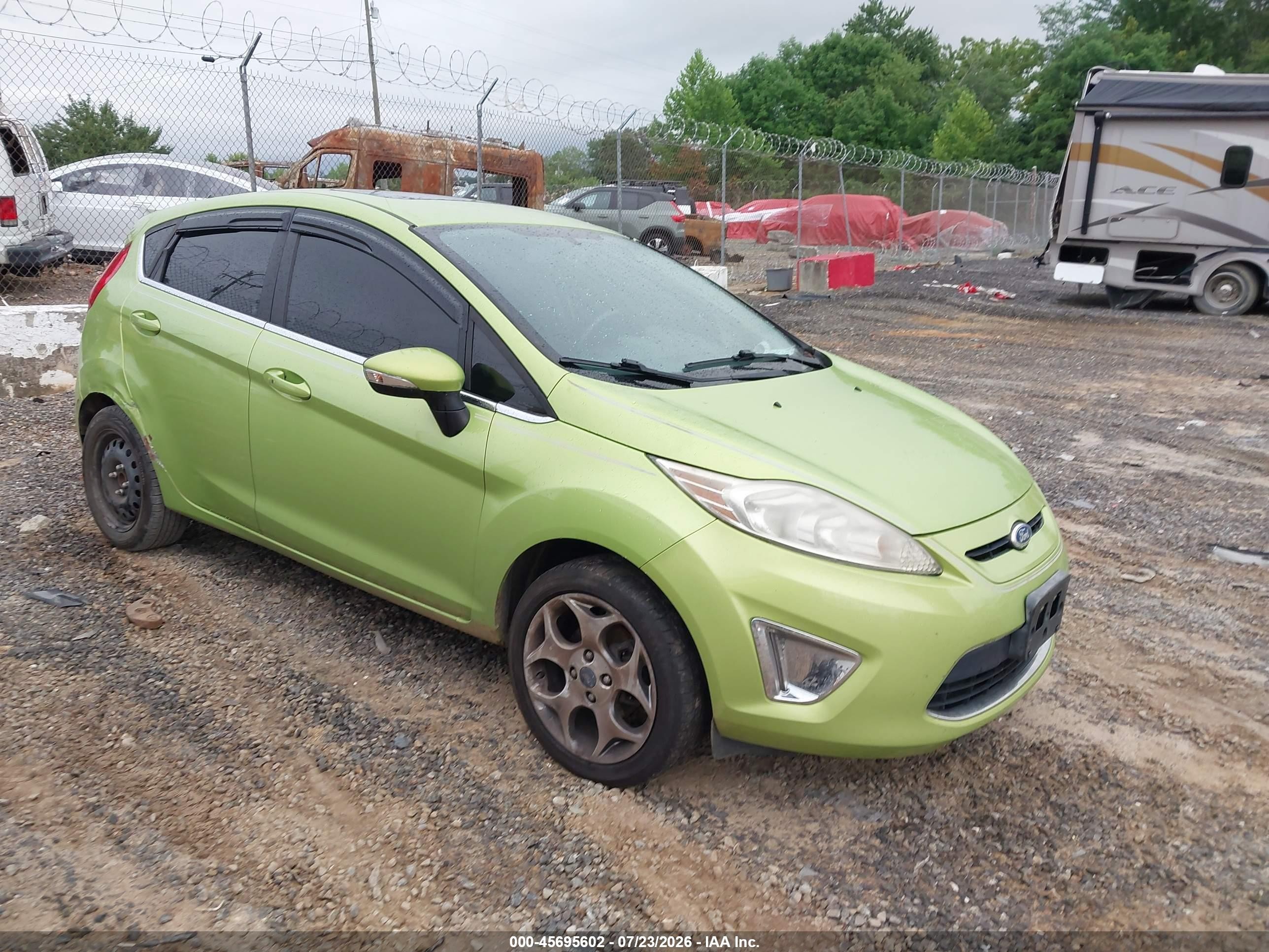 2011 Ford Fiesta SES, VIN 3FADP4FJXBM132046 — Normal wear