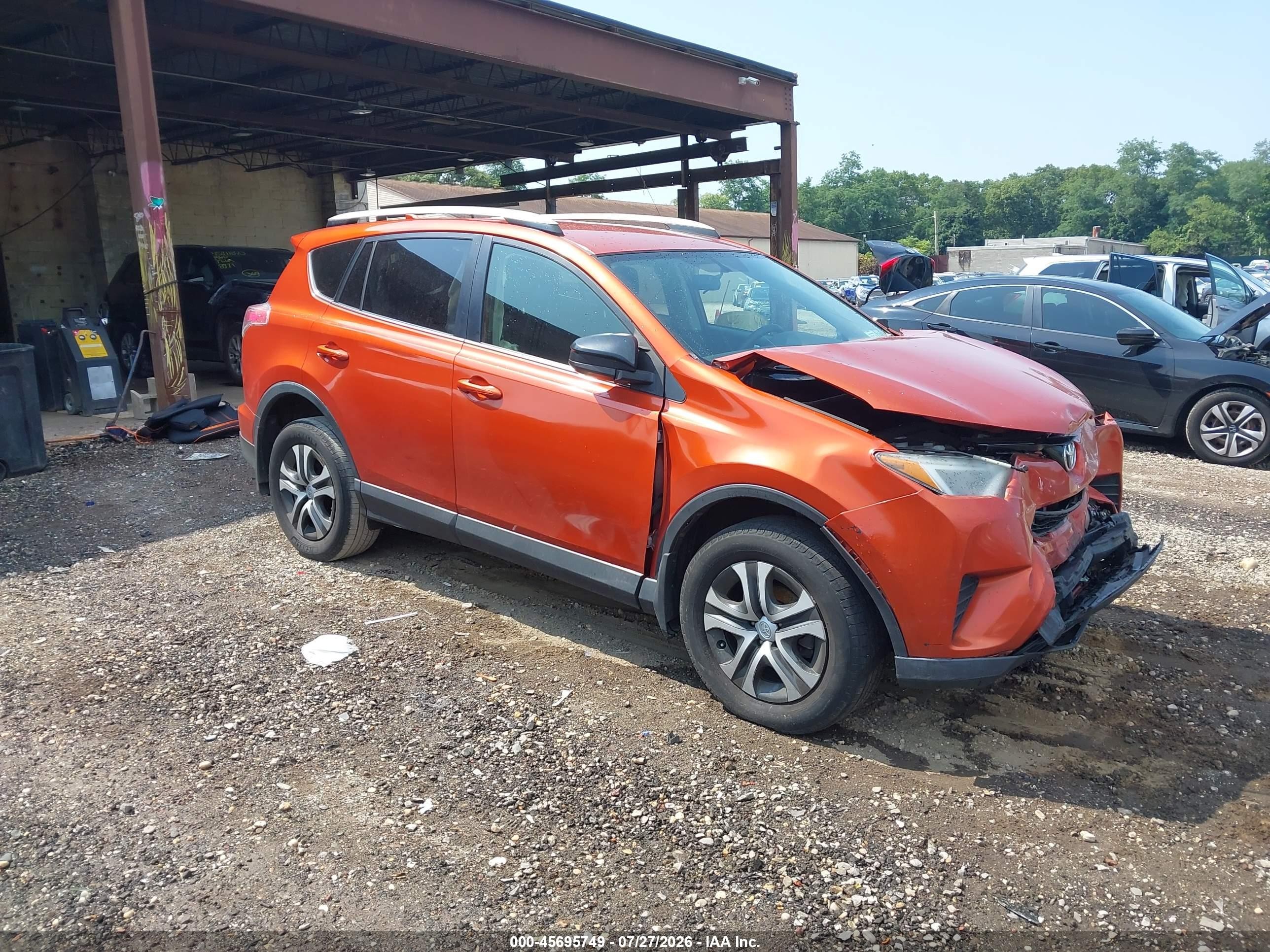 2016 Toyota RAV4 LE, VIN JTMBFREV5GD196679 — Front end