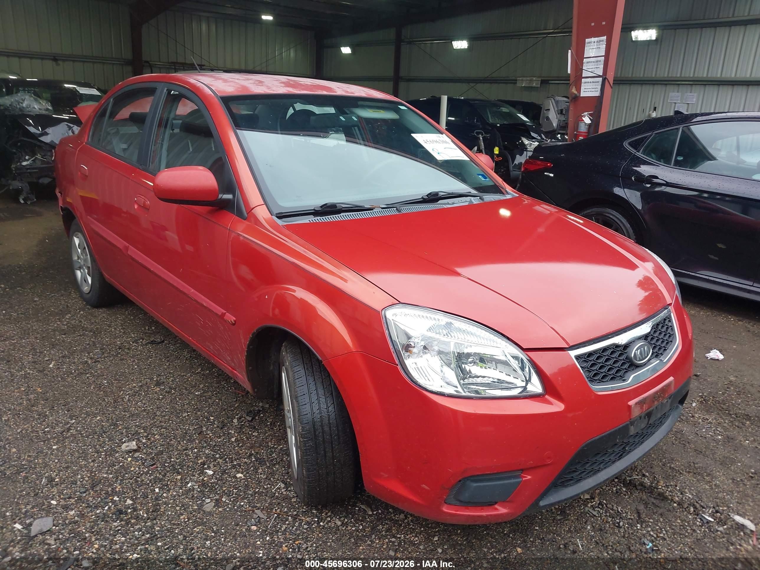 2011 Kia Rio LX, VIN KNADH4A36B6736349 — Rear end