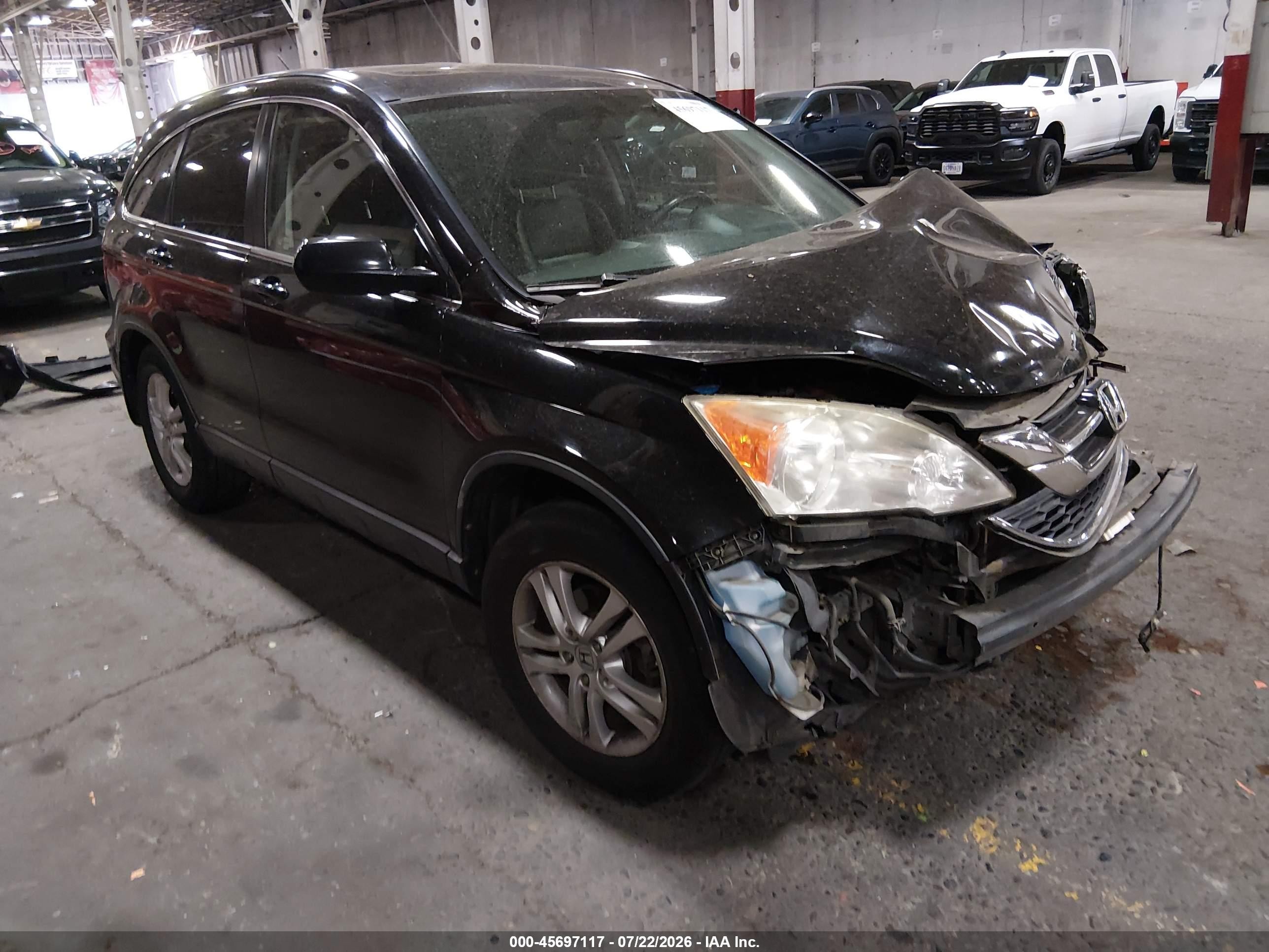 2011 Honda CR-V EX-L, VIN JHLRE4H7XBC018821 — Normal wear