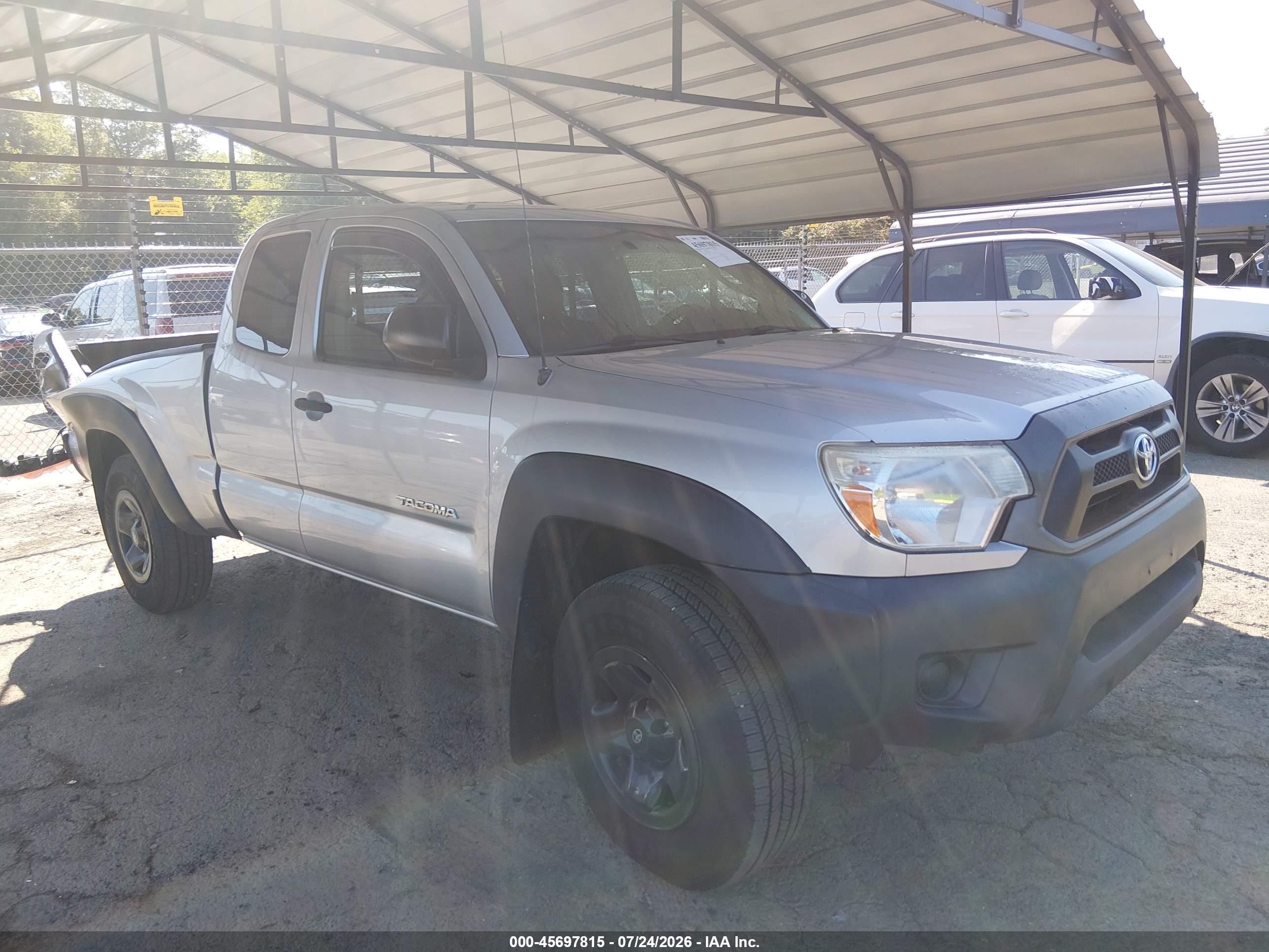 2013 Toyota Tacoma, VIN 5TFUX4EN6DX022946 — Бок