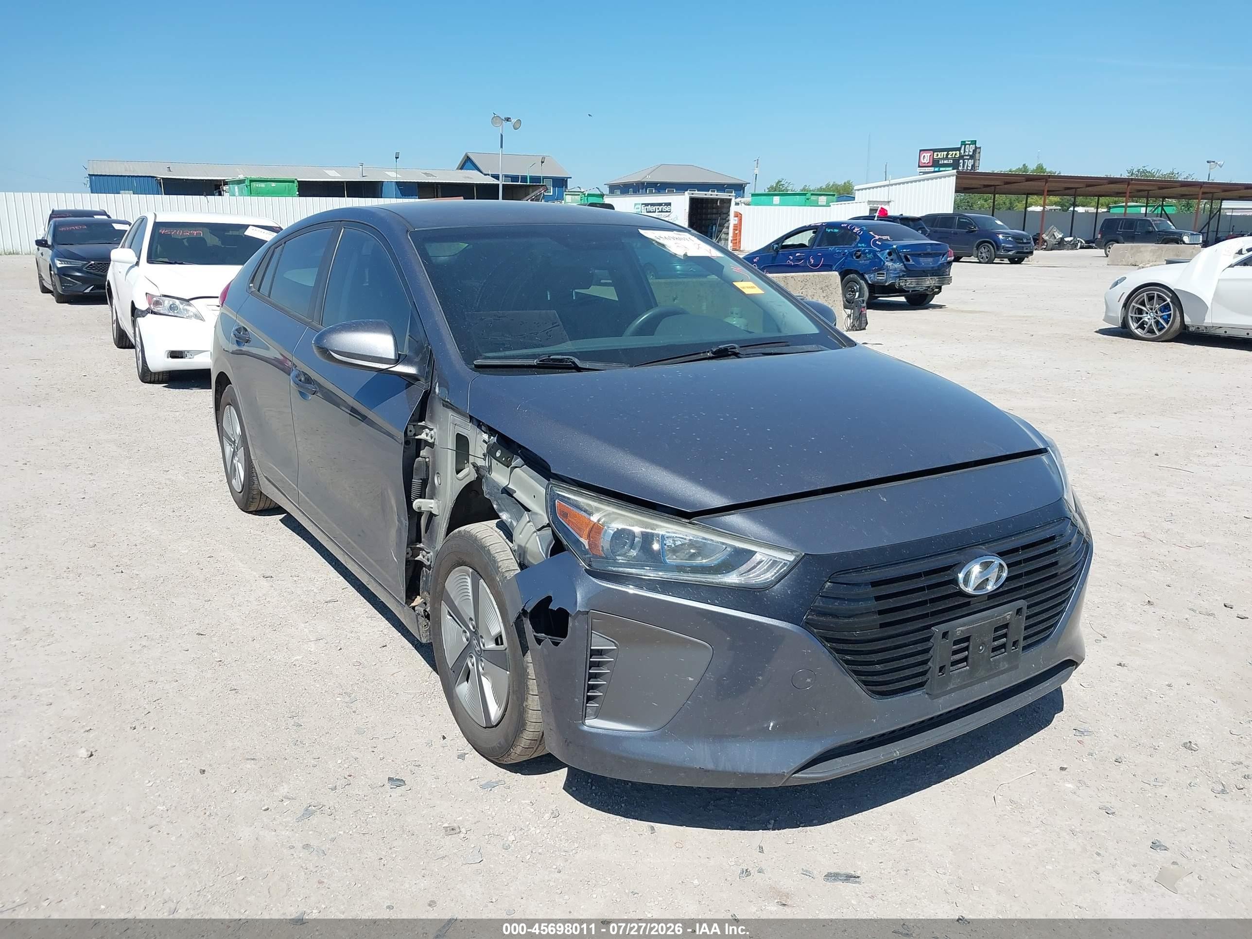 2017 Hyundai Ioniq Blue, VIN KMHC65LC7HU025136 — Бок