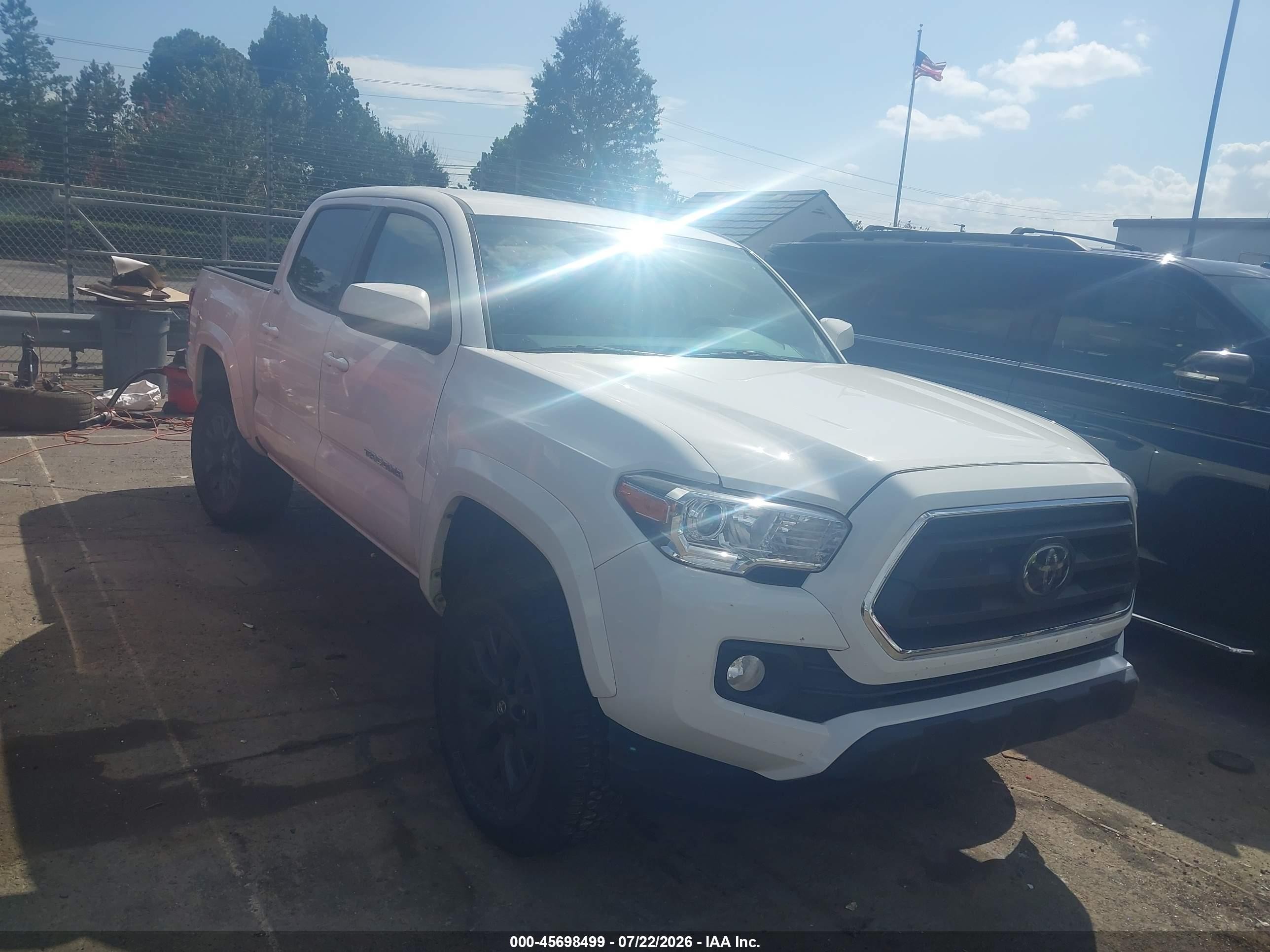 2021 Toyota Tacoma SR5, VIN 3TMAZ5CN9MM148116 — Side