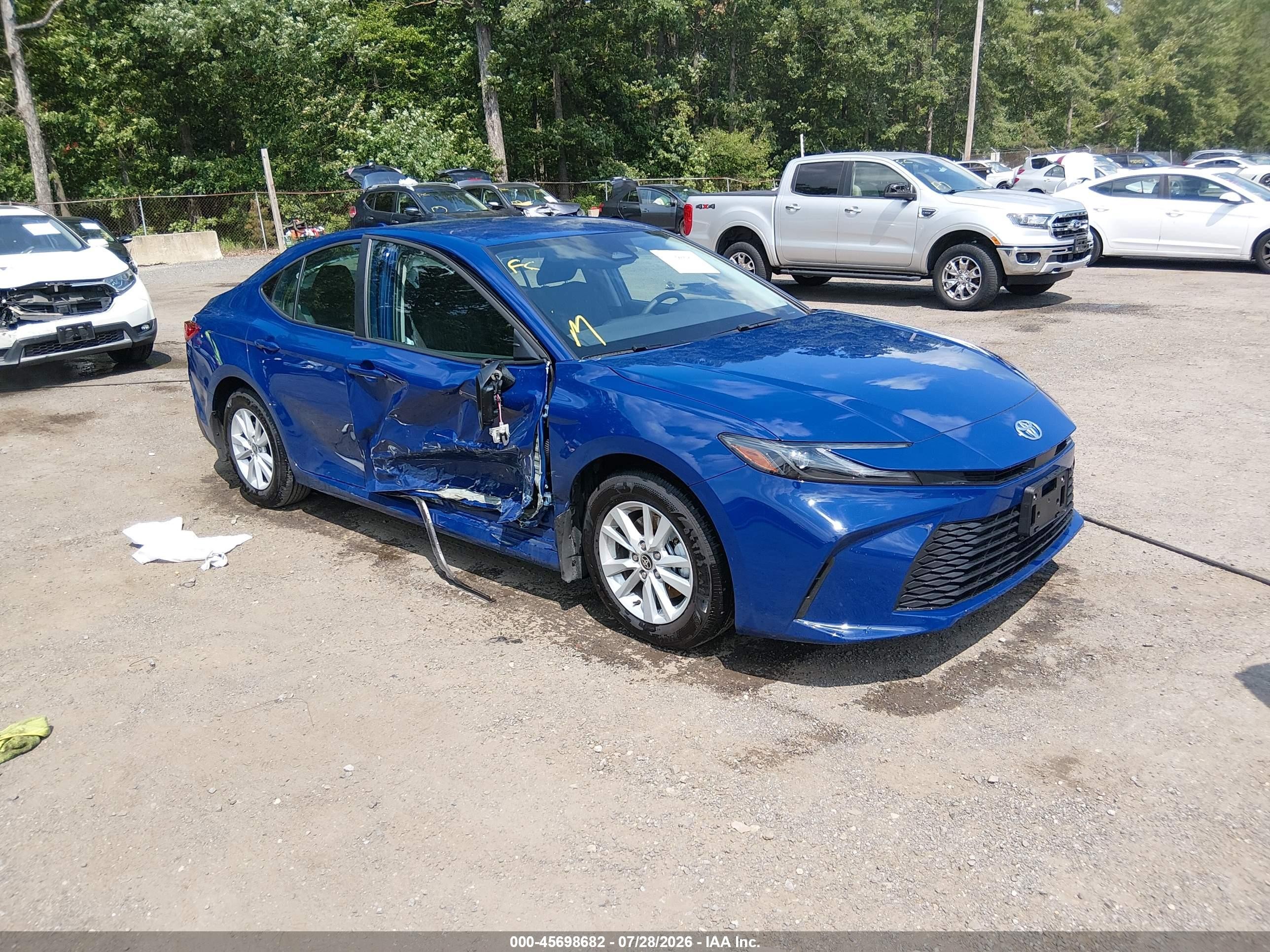 2026 Toyota Camry XSE, VIN 4T1DAACK7TU305117 — Бок