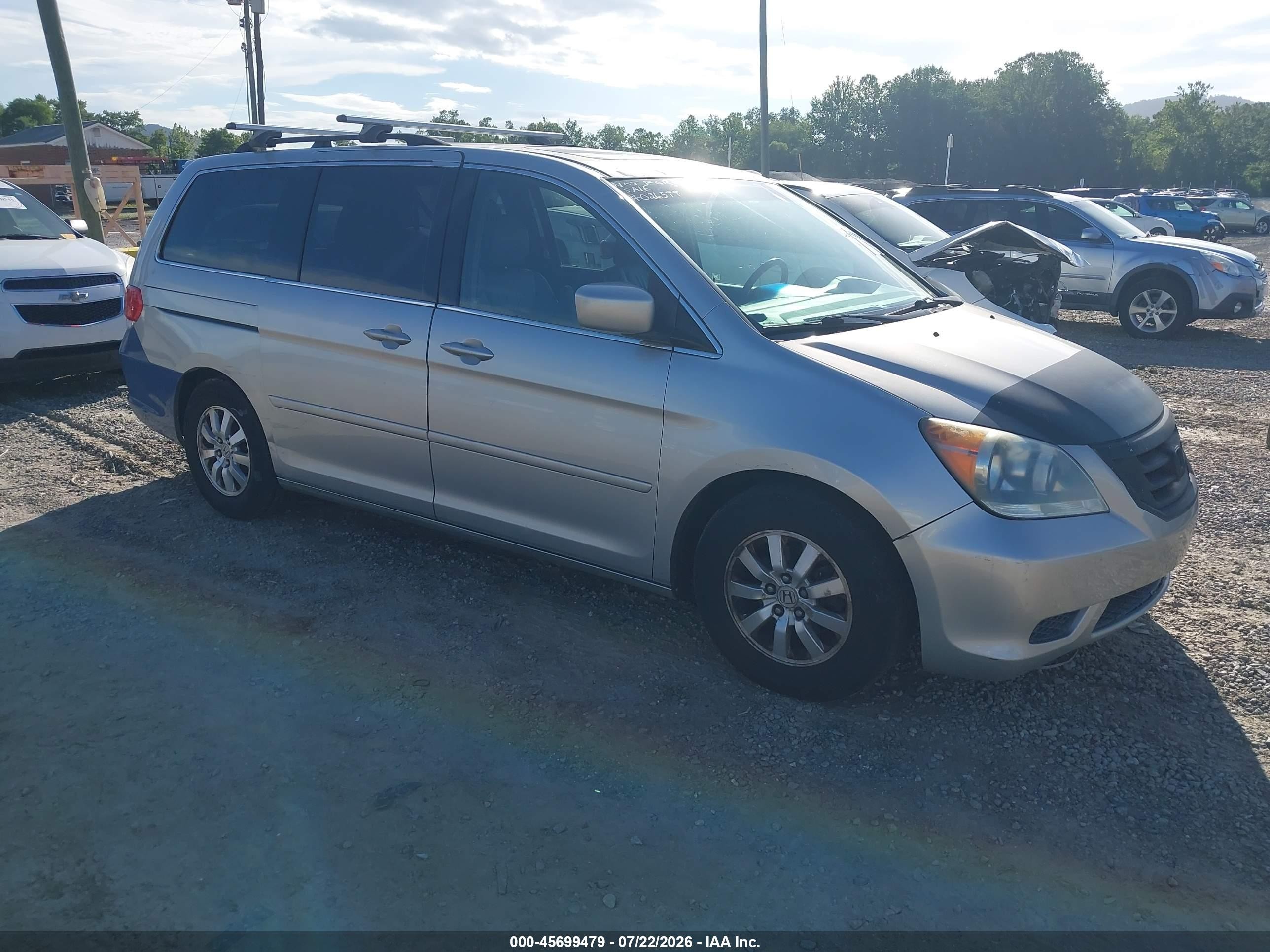 2009 Honda Odyssey EX-L, VIN 5FNRL38769B026599 — Side