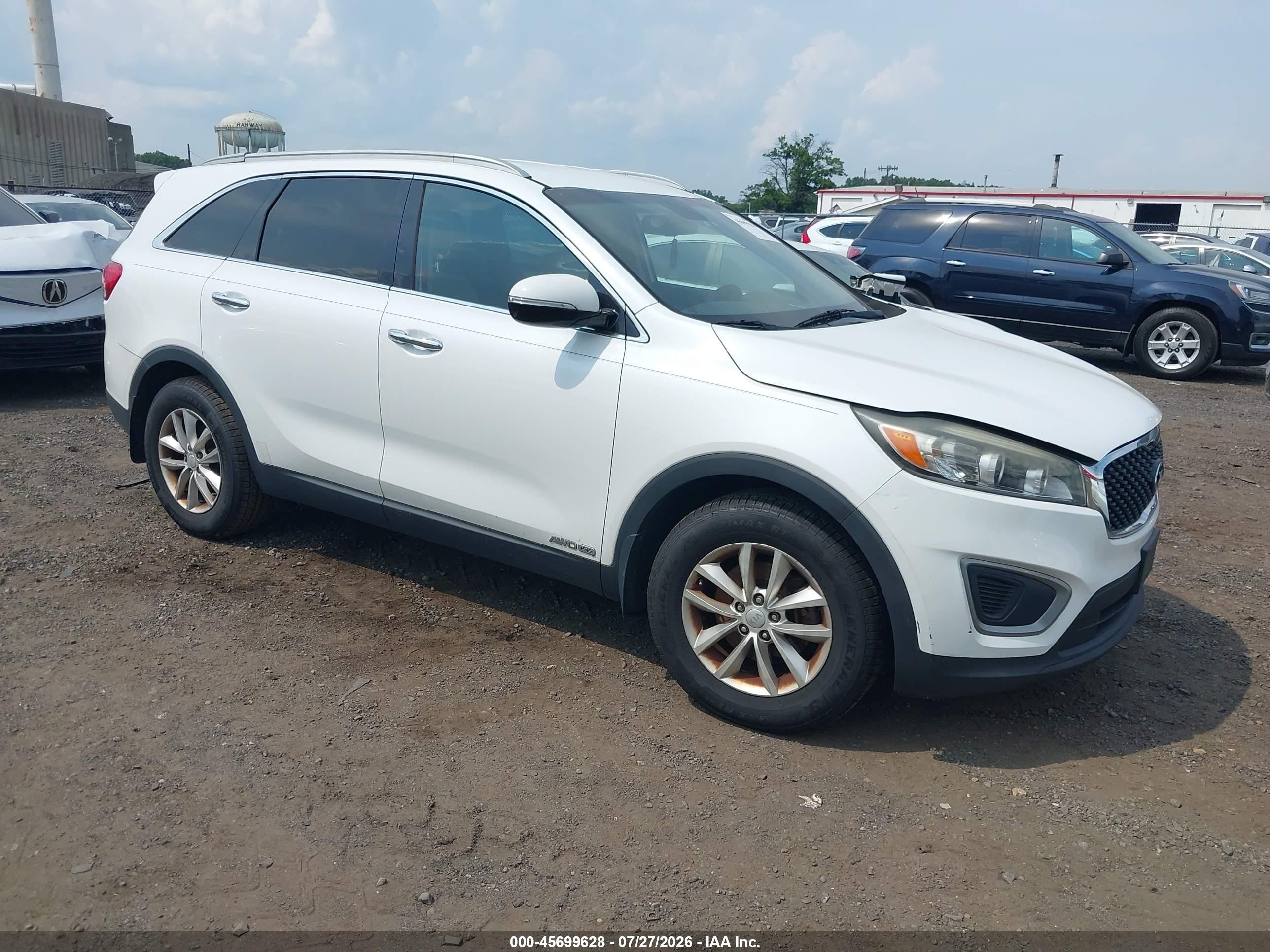 2016 Kia Sorento LX, VIN 5XYPGDA52GG030505 — Normal wear