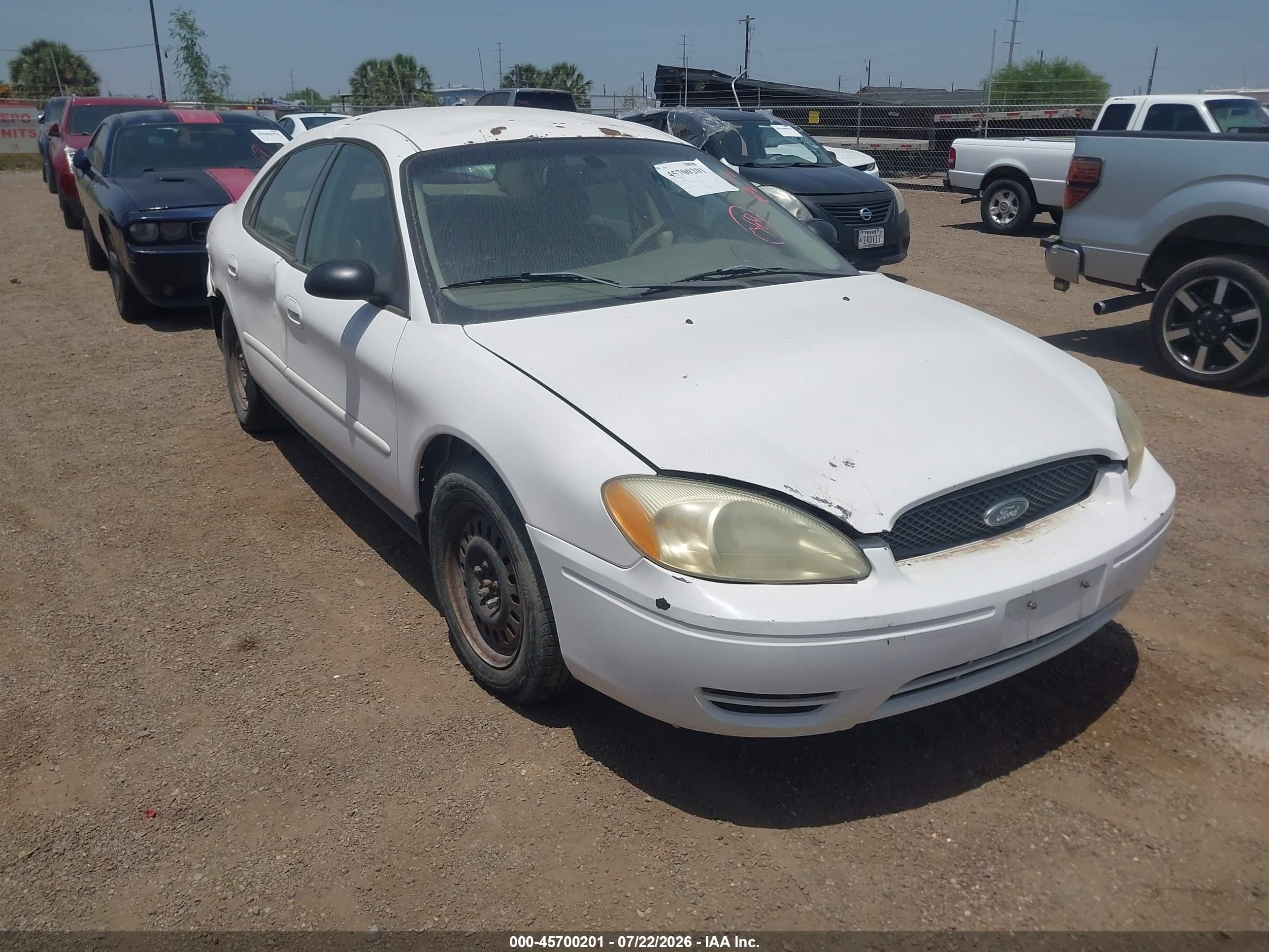 2007 Ford Taurus SE, VIN 1FAFP53U17A102595 — Side