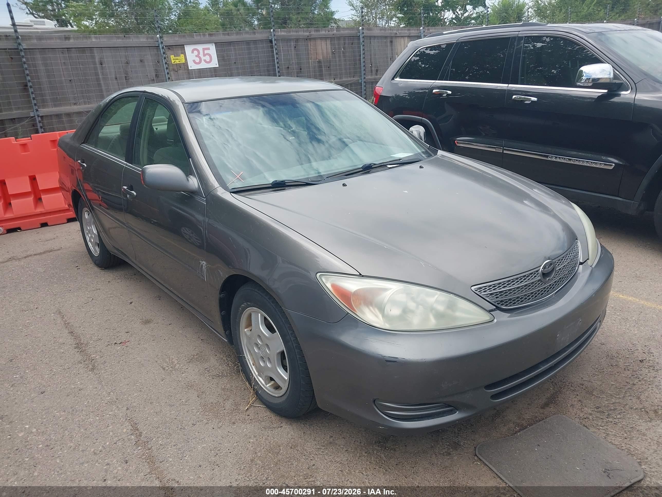 2002 Toyota Camry LE, VIN 4T1BF30K82U529200 — Normal wear