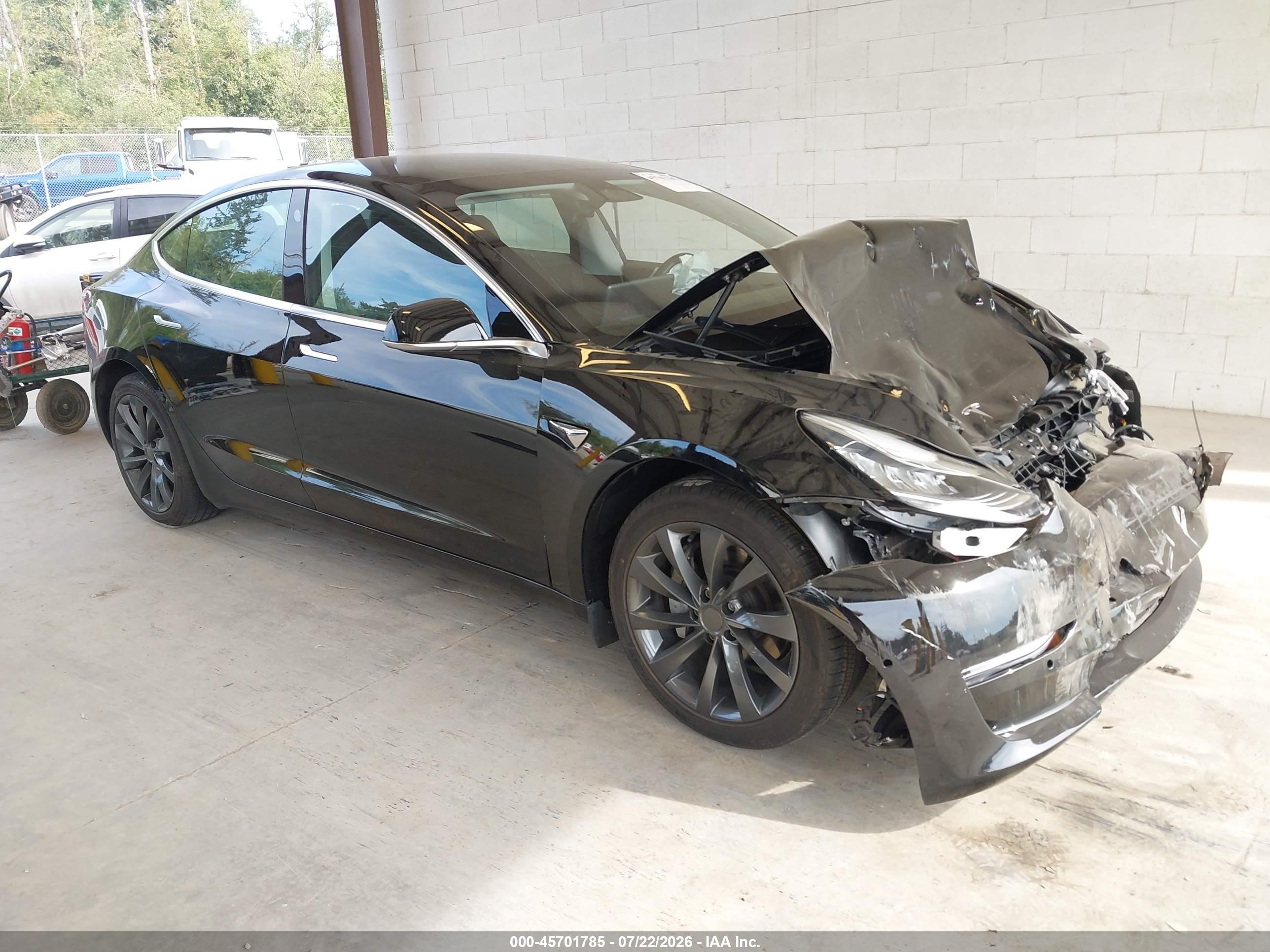 2020 Tesla Model 3 Standard Range Plus, VIN 5YJ3E1EA4LF625206 — Front end