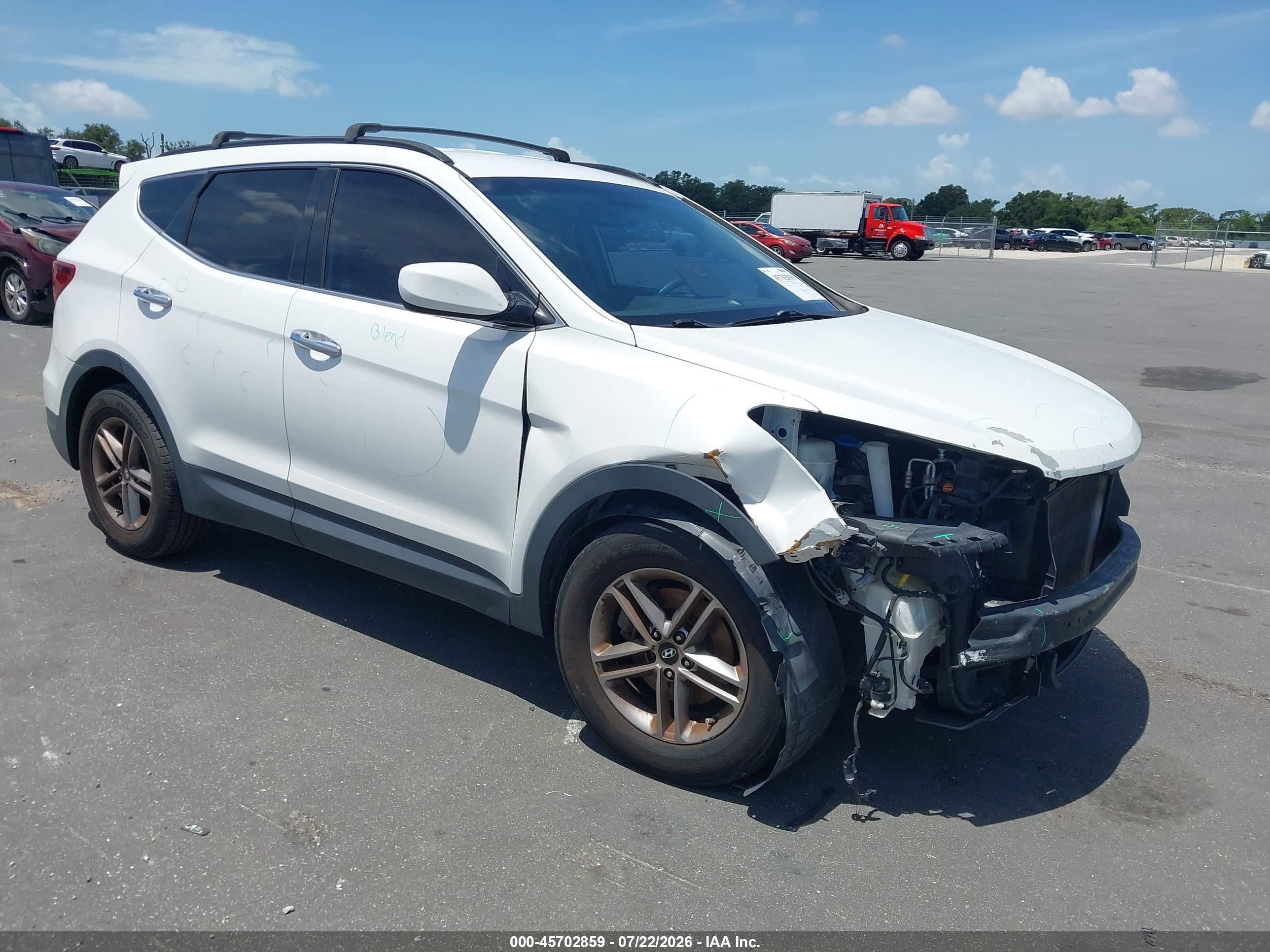 2017 Hyundai Santa Fe 2.4L, VIN 5NMZU3LB9HH009995 — Front end