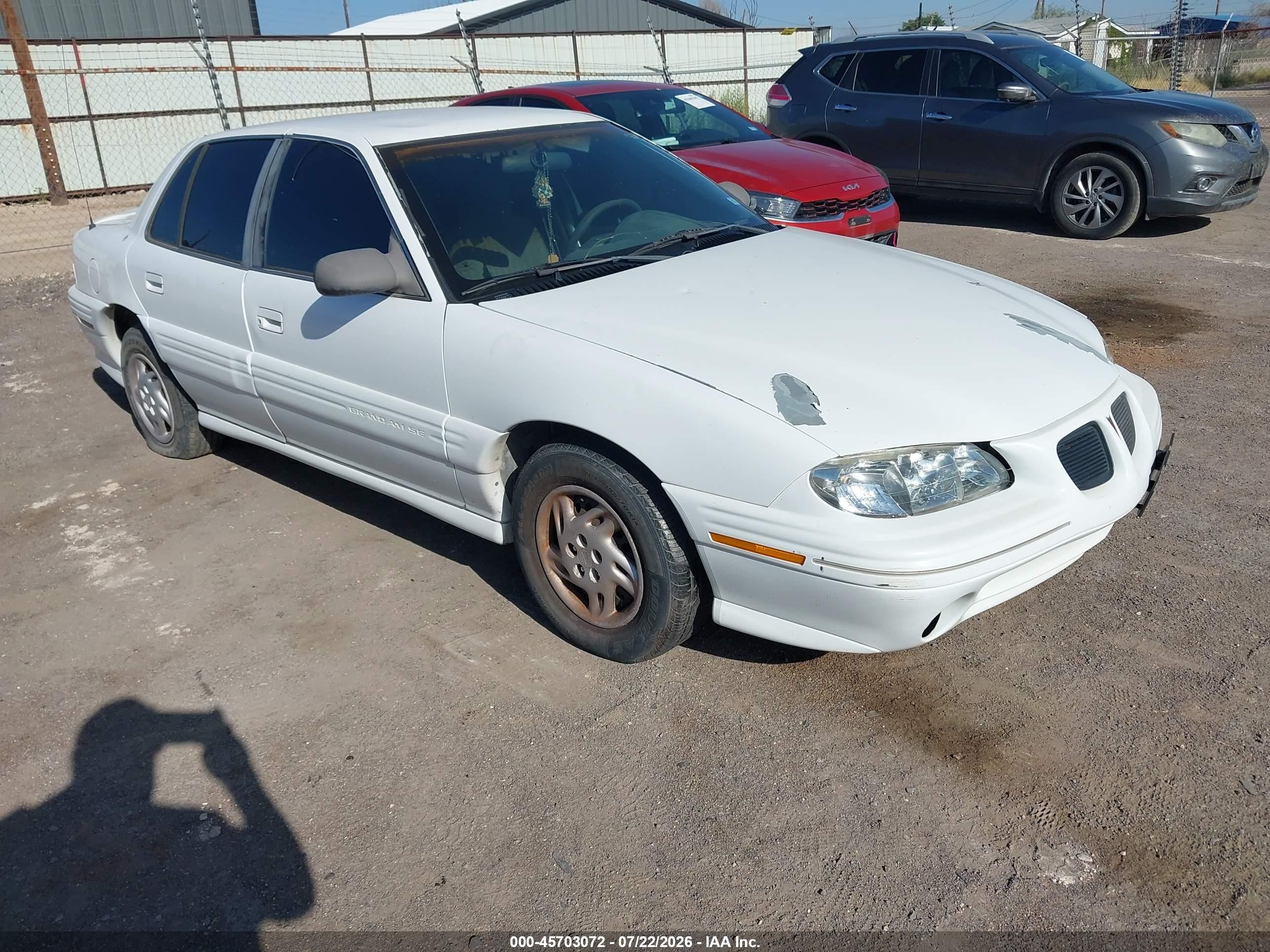 1998 Pontiac Grand Am SE, VIN 1G2NE52T1WM521195 — Normal wear