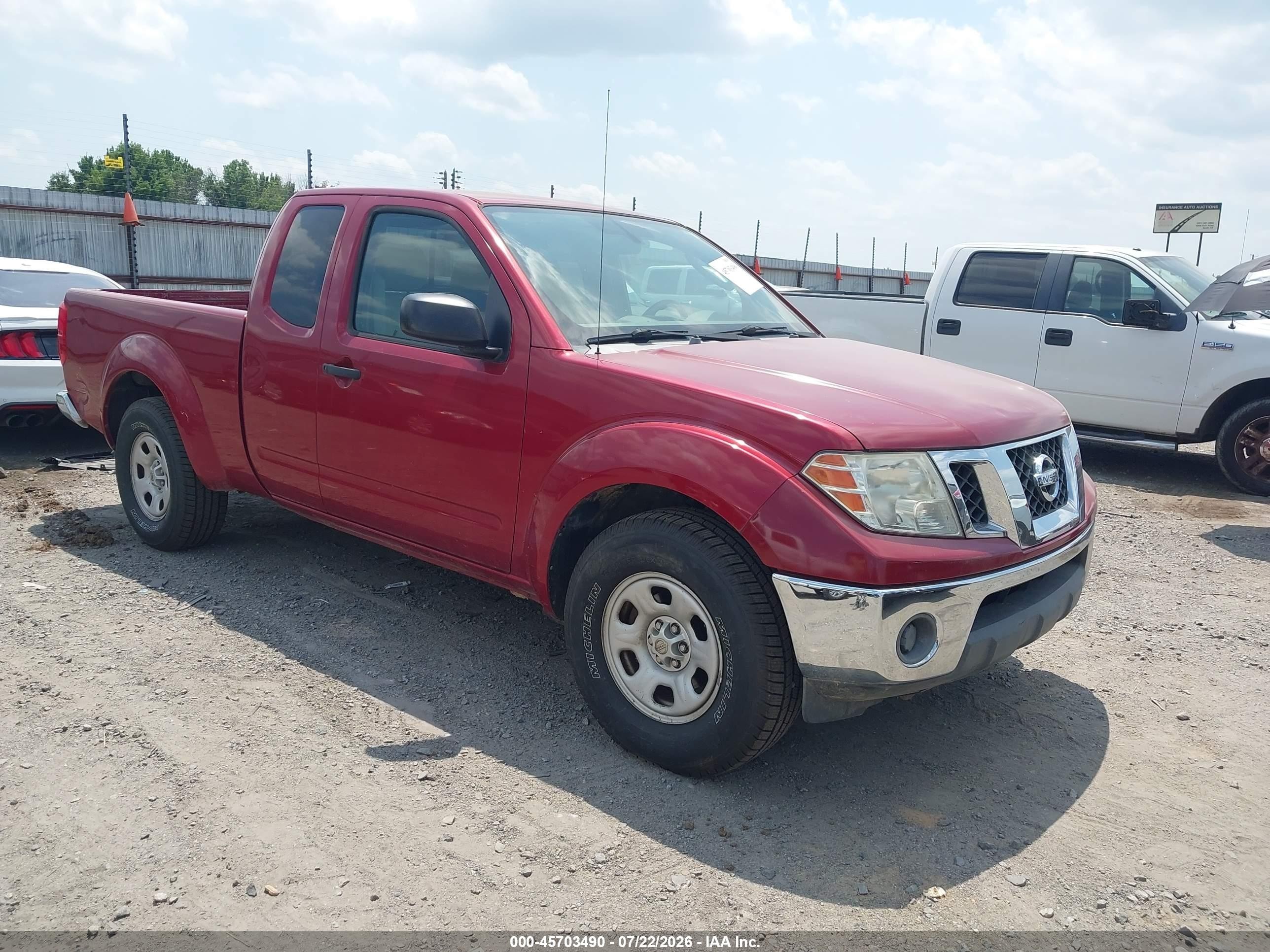 2009 Nissan Frontier SE, VIN 1N6AD06U39C418399 — Side