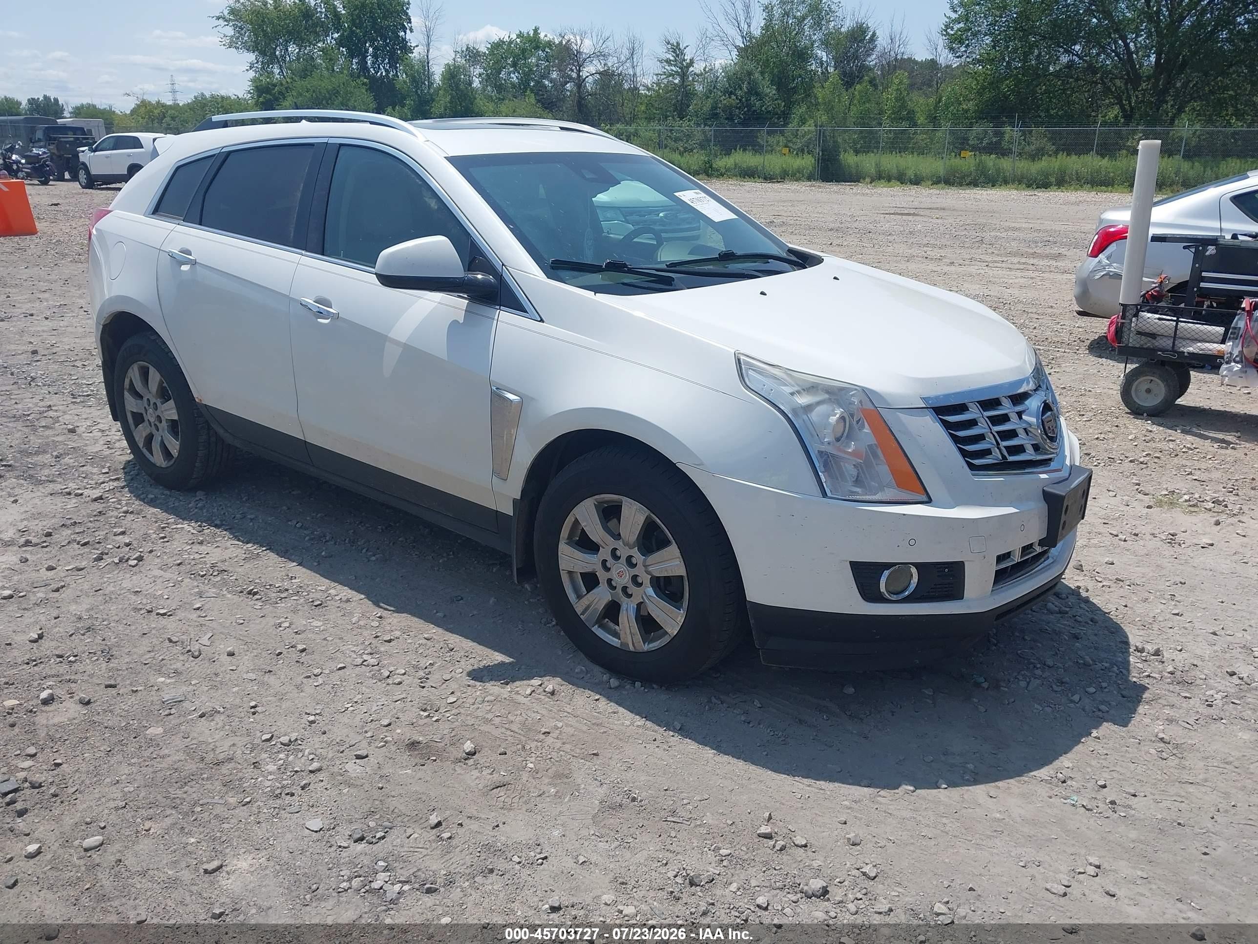 2014 Cadillac SRX Luxury Collection, VIN 3GYFNEE31ES587007 — Front end