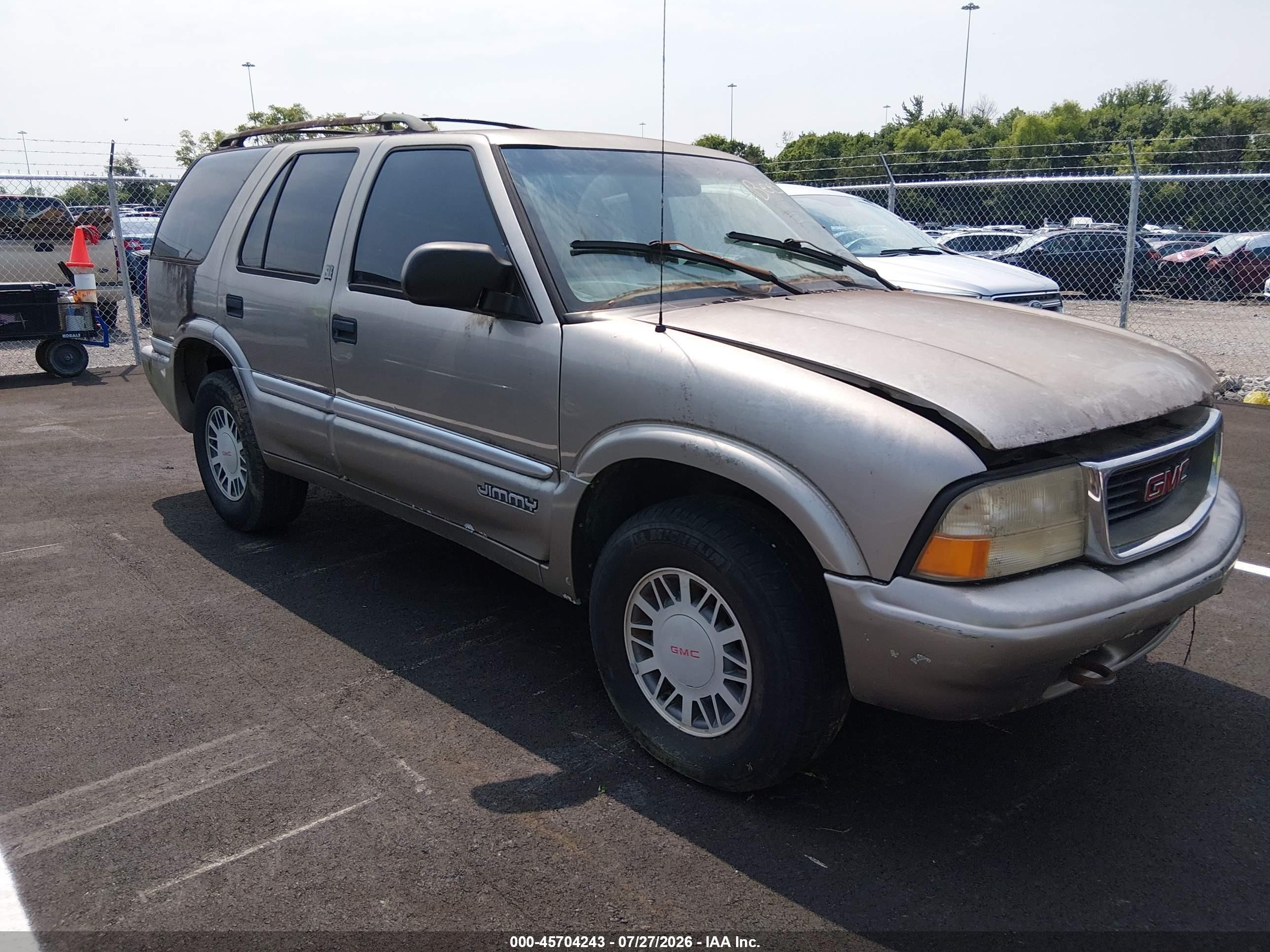 1999 GMC Jimmy SLT, VIN 1GKDT13WXX2554261 — Normal wear