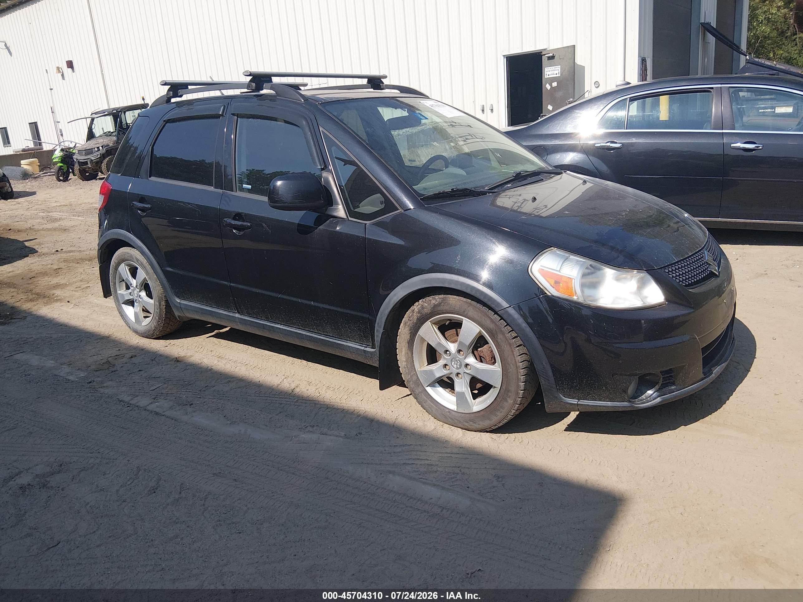 2011 Suzuki SX4 Crossover, VIN JS2YB5A36B6302109 — Normal wear