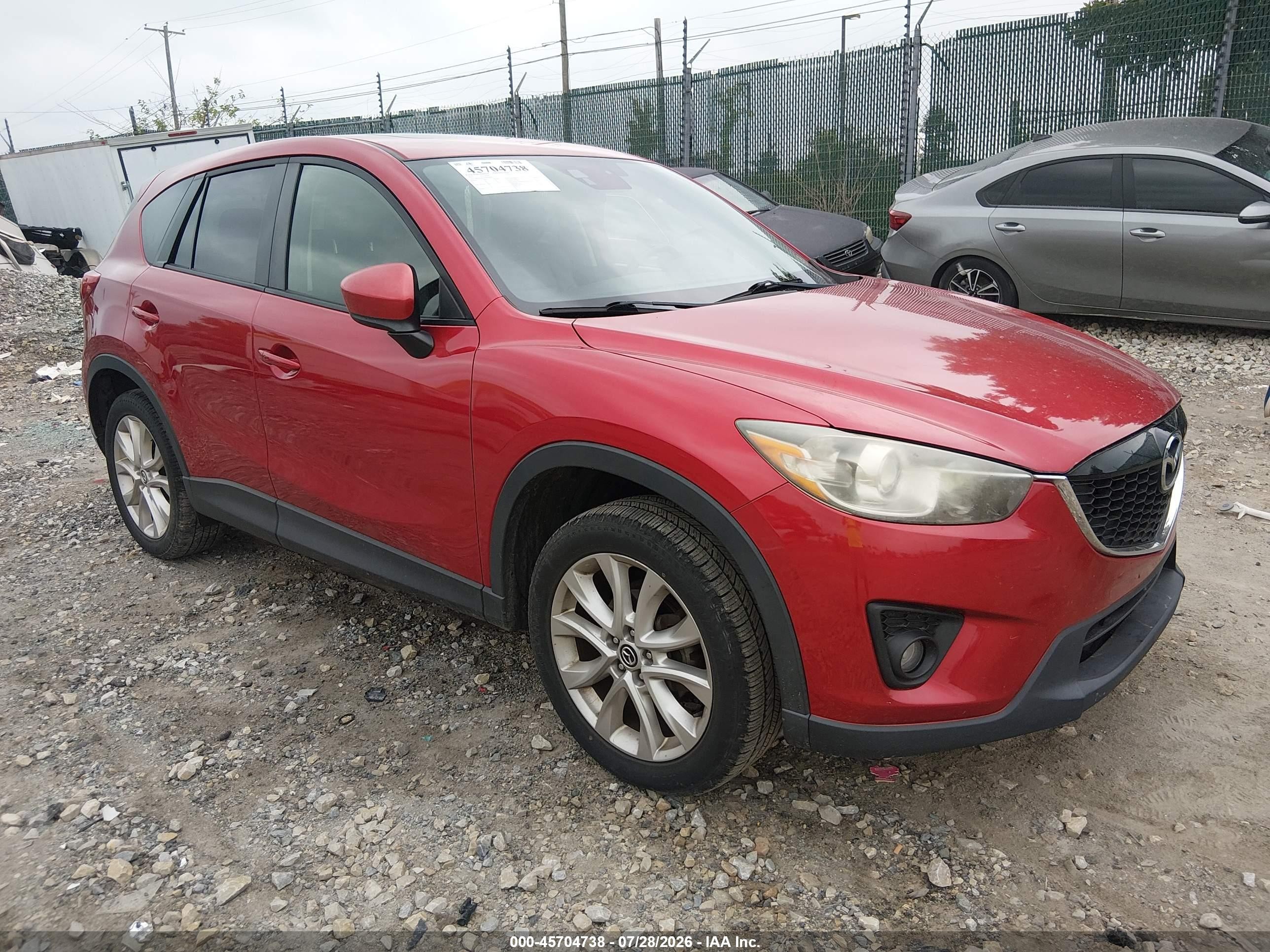 2015 Mazda CX-5 Grand Touring, VIN JM3KE4DY0F0459269 — Side