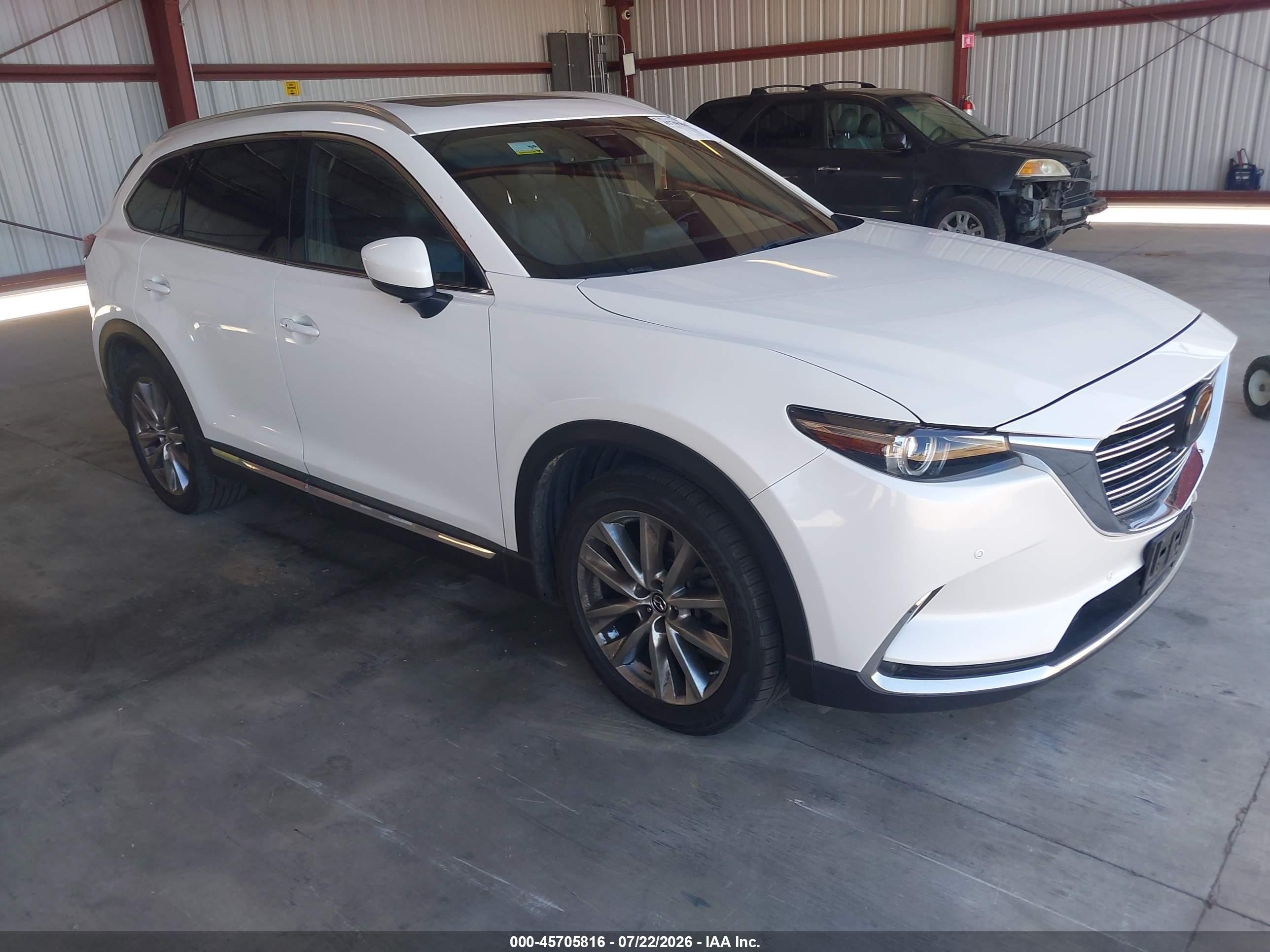 2019 Mazda CX-9 Grand Touring, VIN JM3TCBDY1K0334211 — Бок