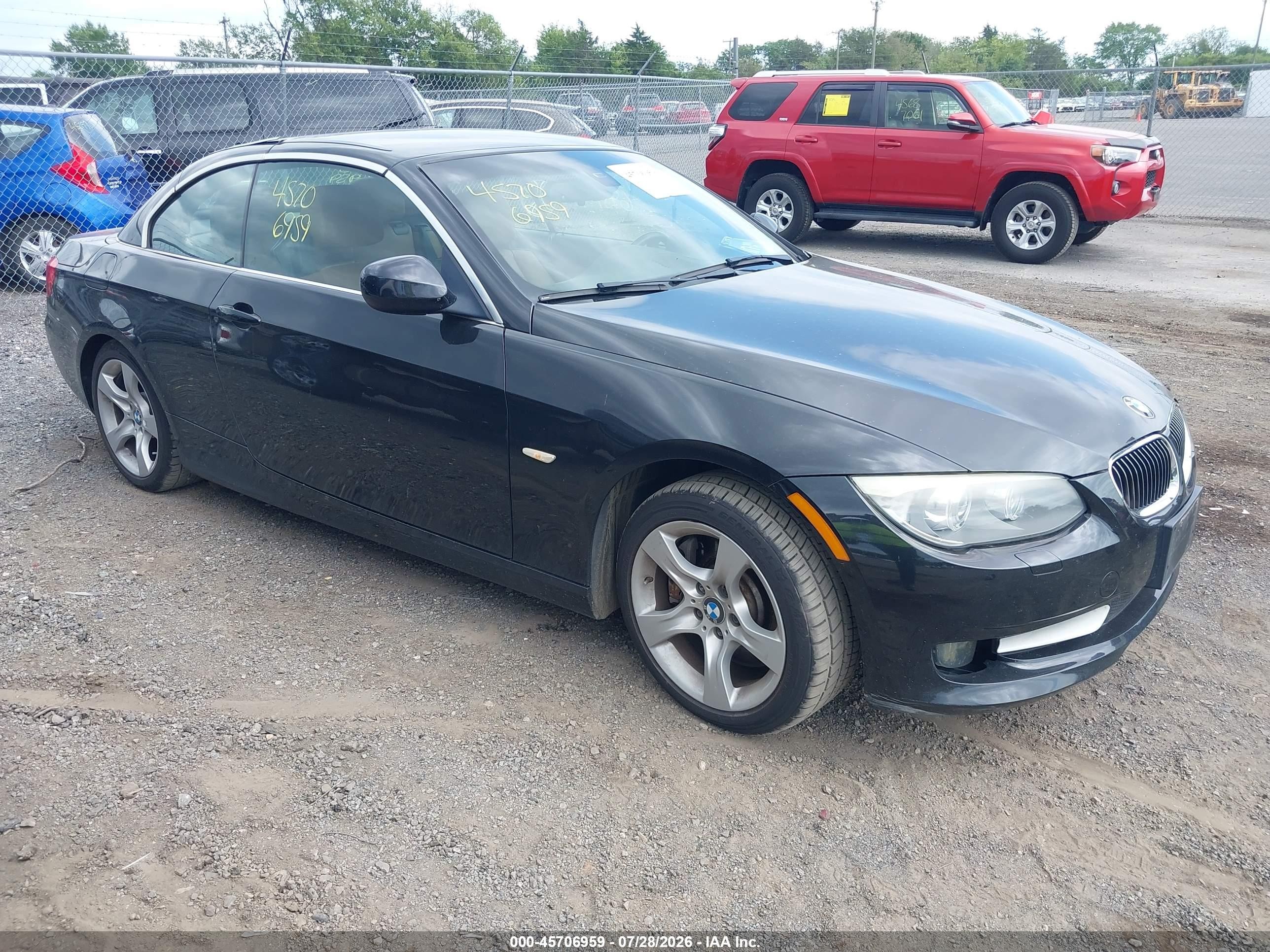2011 BMW 3 Series 335i, VIN WBADX7C50BE743418 — Rear end