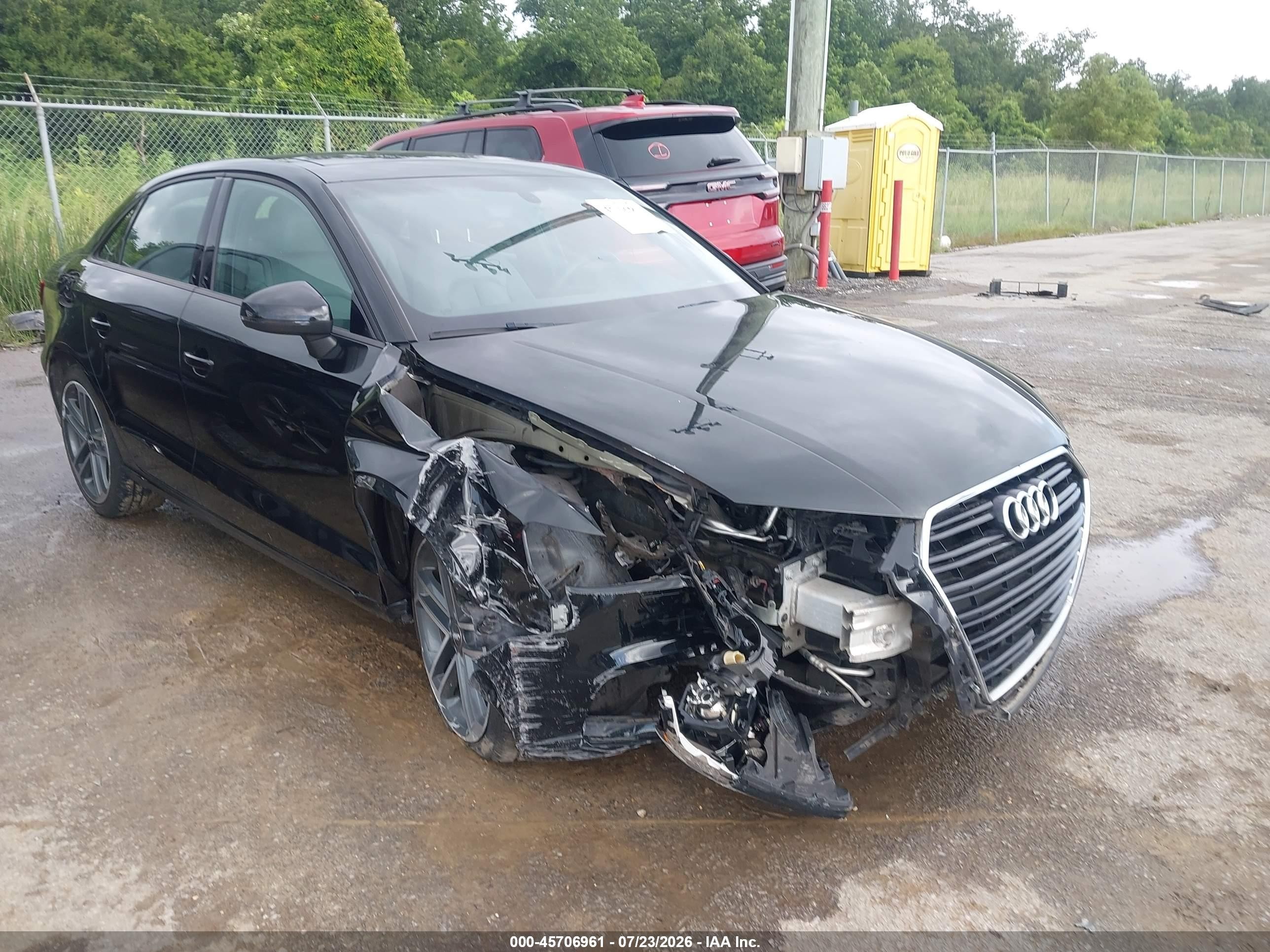2018 Audi A3 Premium, VIN WAUAUGFF5J1010755 — Side