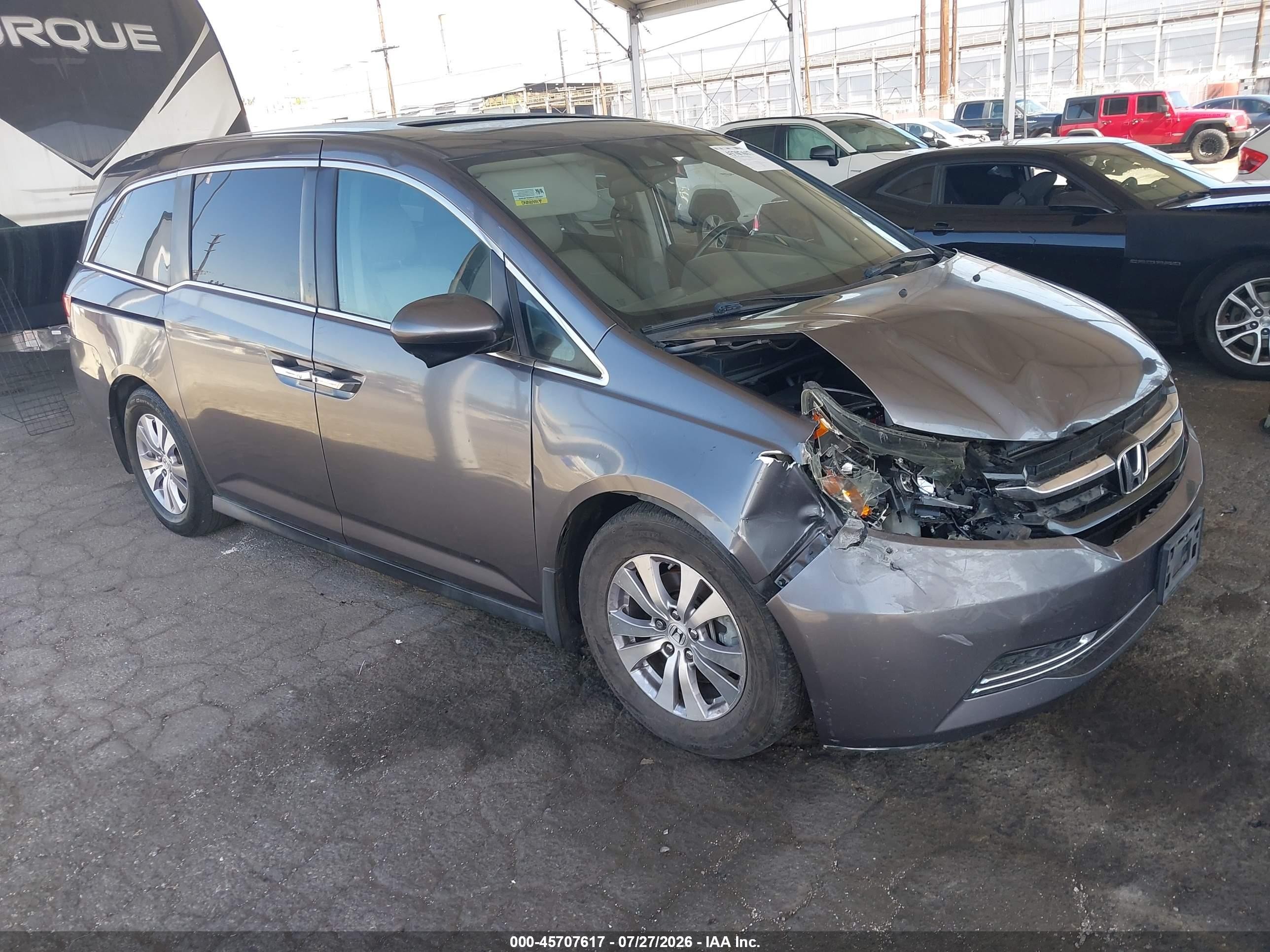 2015 Honda Odyssey EX-L, VIN 5FNRL5H6XFB070104 — Front end