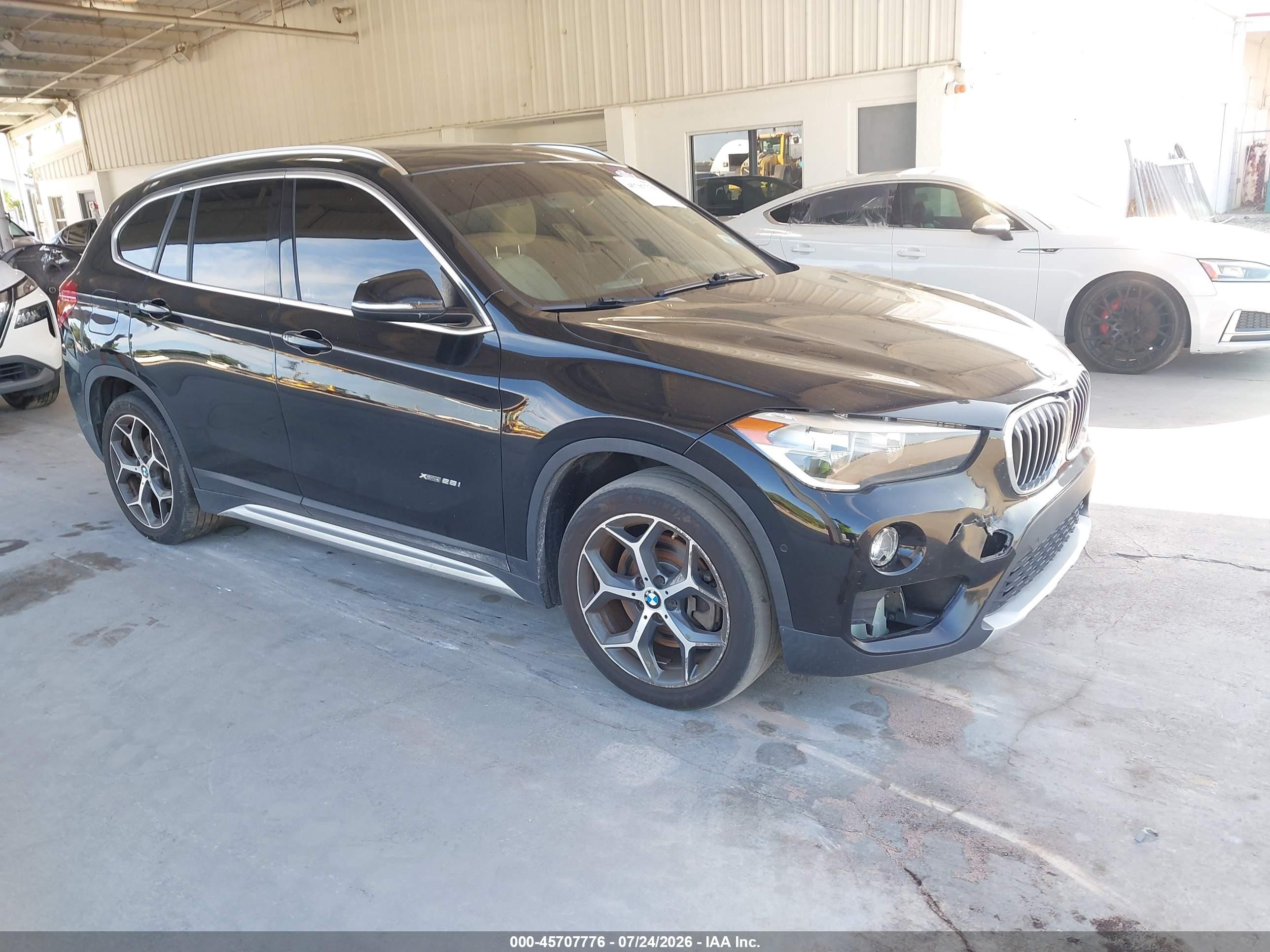 2016 BMW X1 xDrive28i, VIN WBXHT3C31G5F64289 — Normal wear