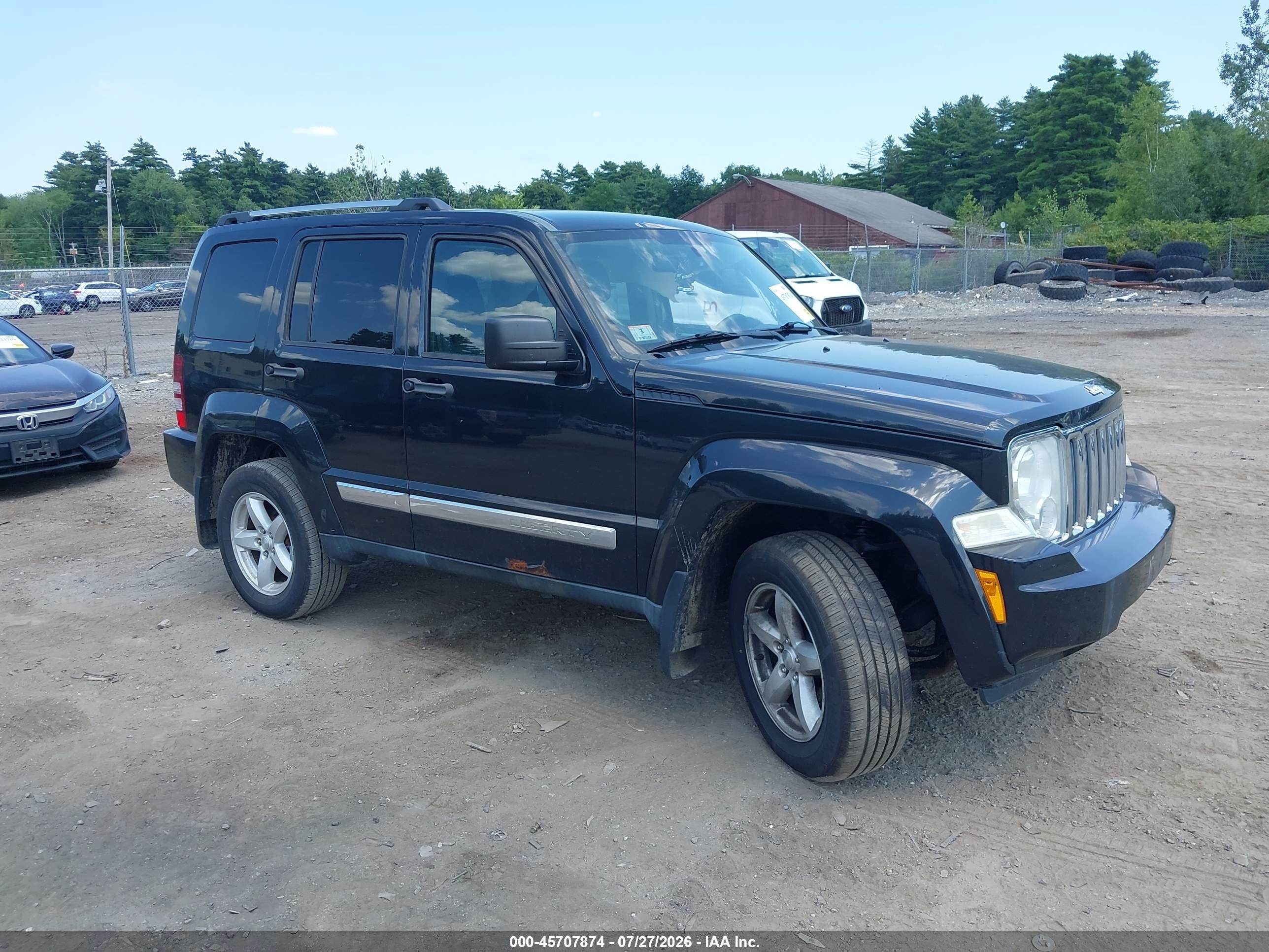 2012 Jeep Liberty Limited, VIN 1C4PJMCK7CW111310 — Side