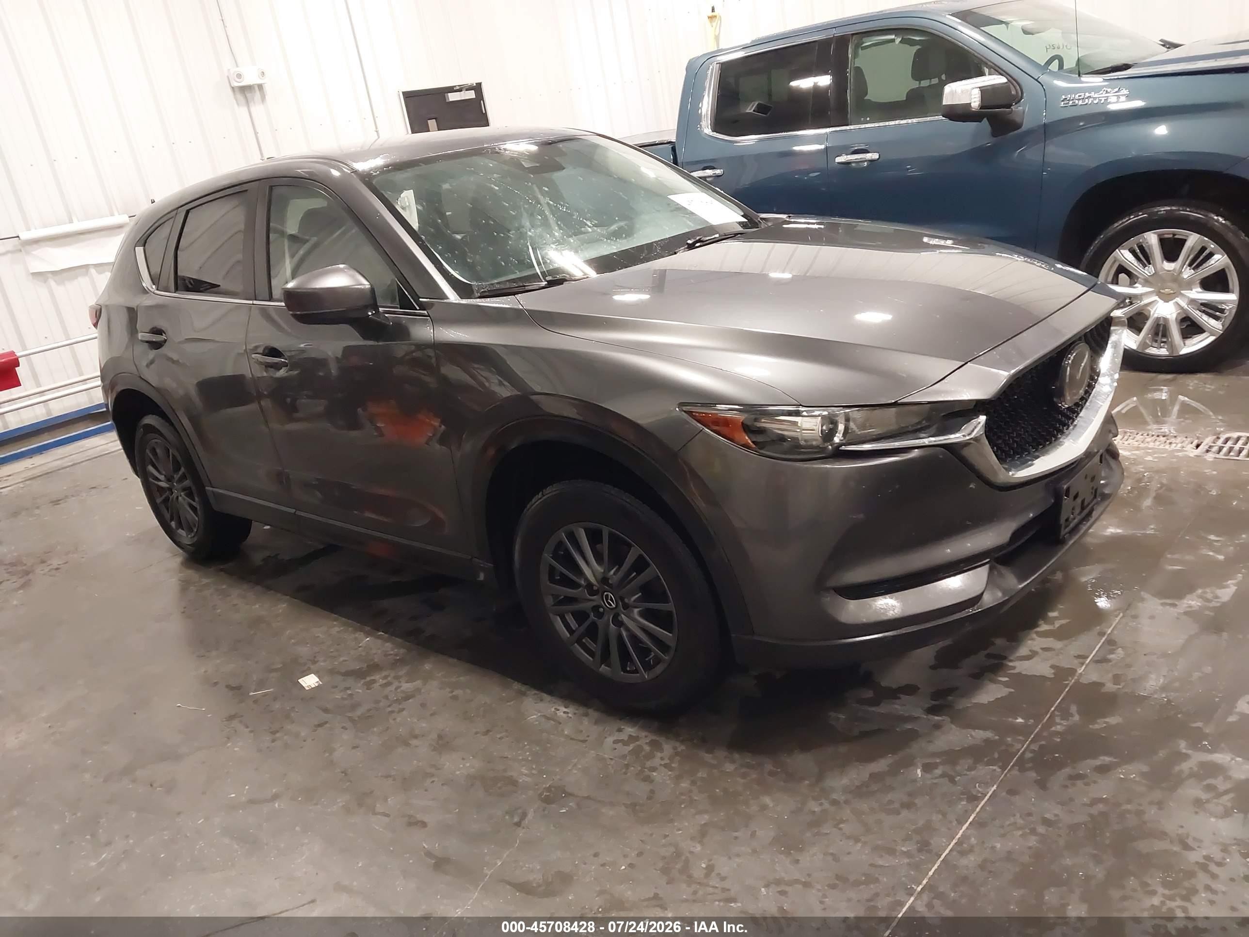 2019 Mazda CX-5 Touring, VIN JM3KFBCM8K0695680 — Rear end