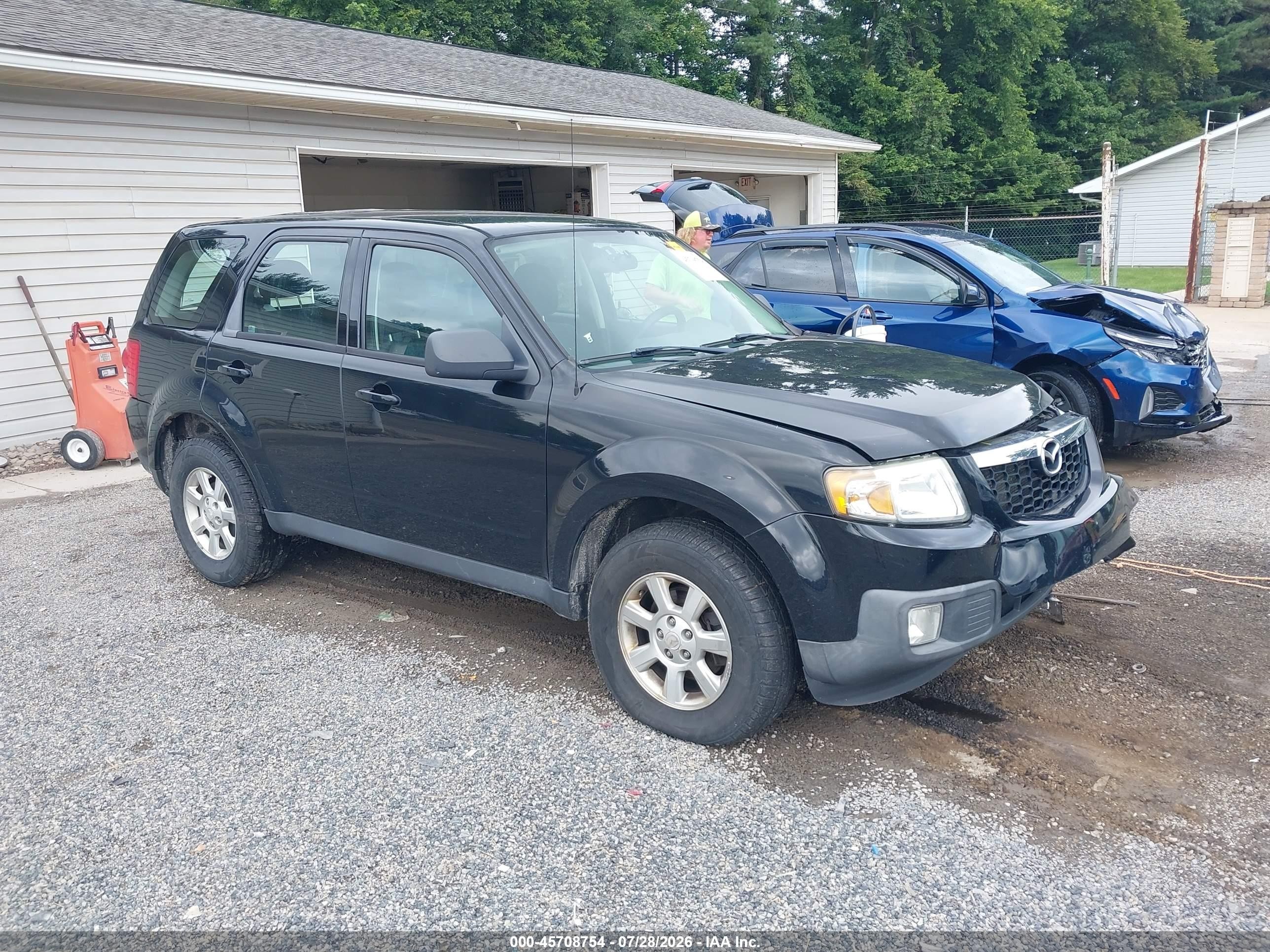 2009 Mazda Tribute Touring, VIN 4F2CZ927X9KM02918 — Перед