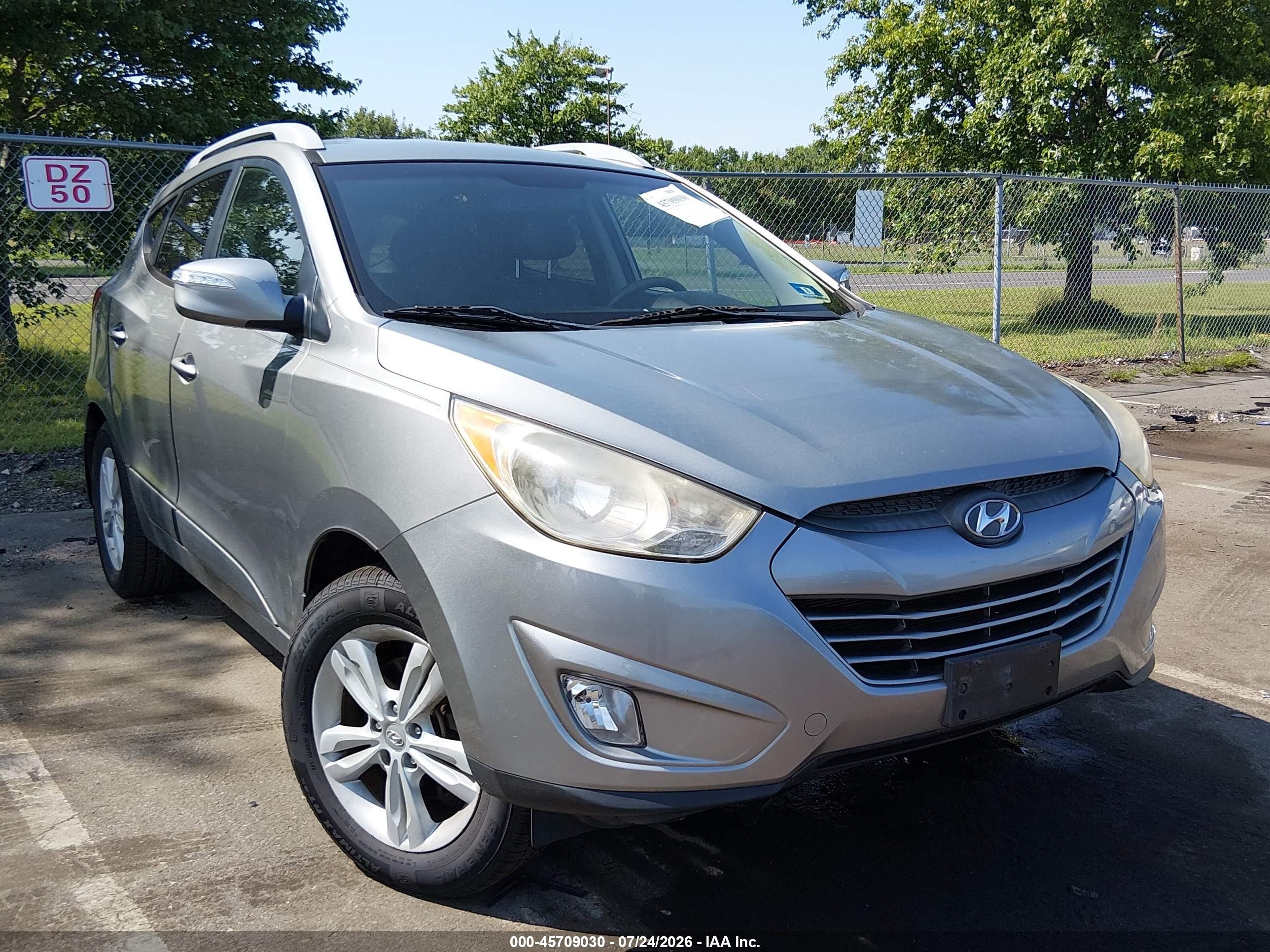 2013 Hyundai Tucson GLS, VIN KM8JU3AC4DU575618 — Water / flood