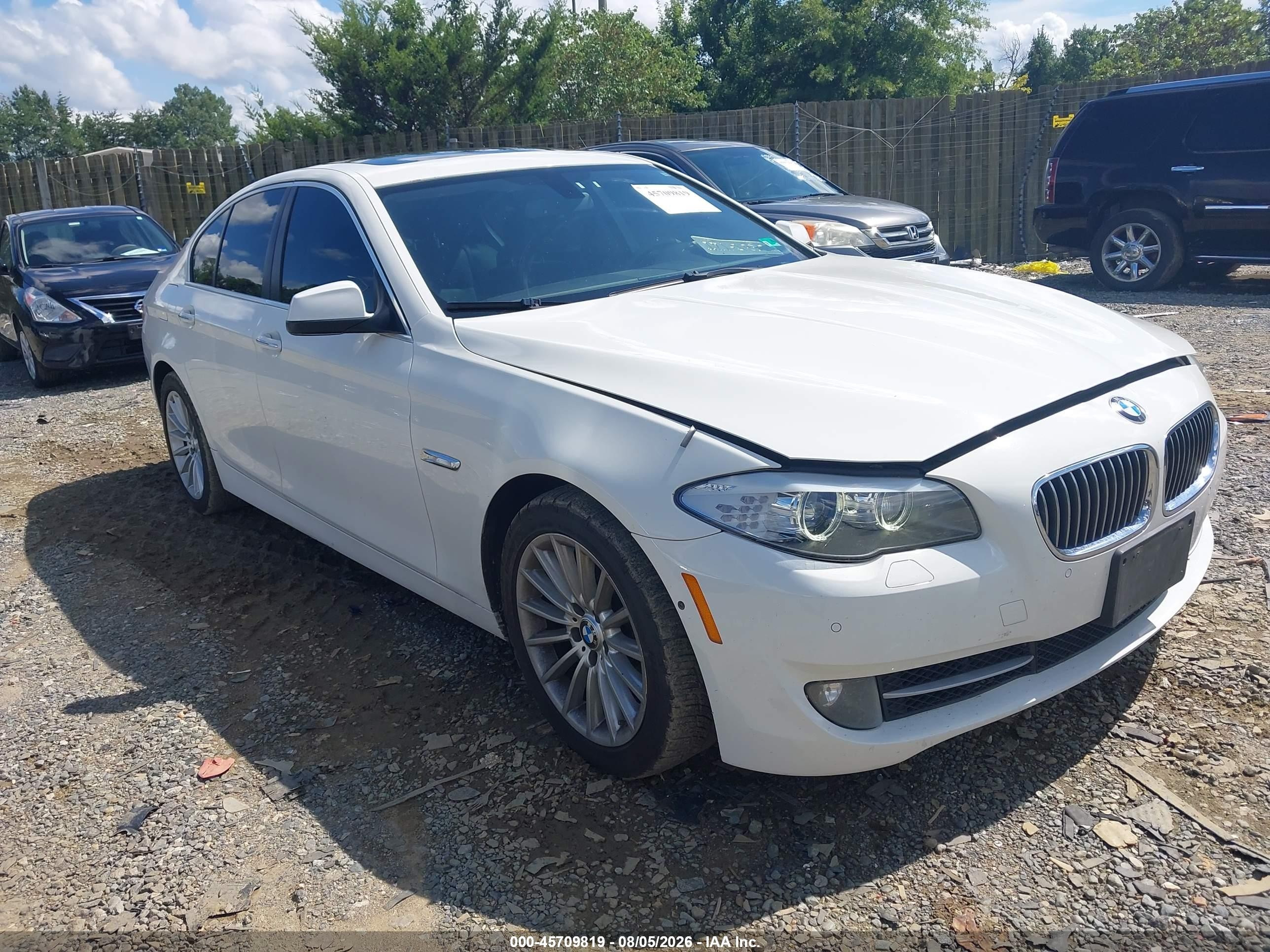 2013 BMW 5 Series 535i, VIN WBAFR7C50DC819253 — Side