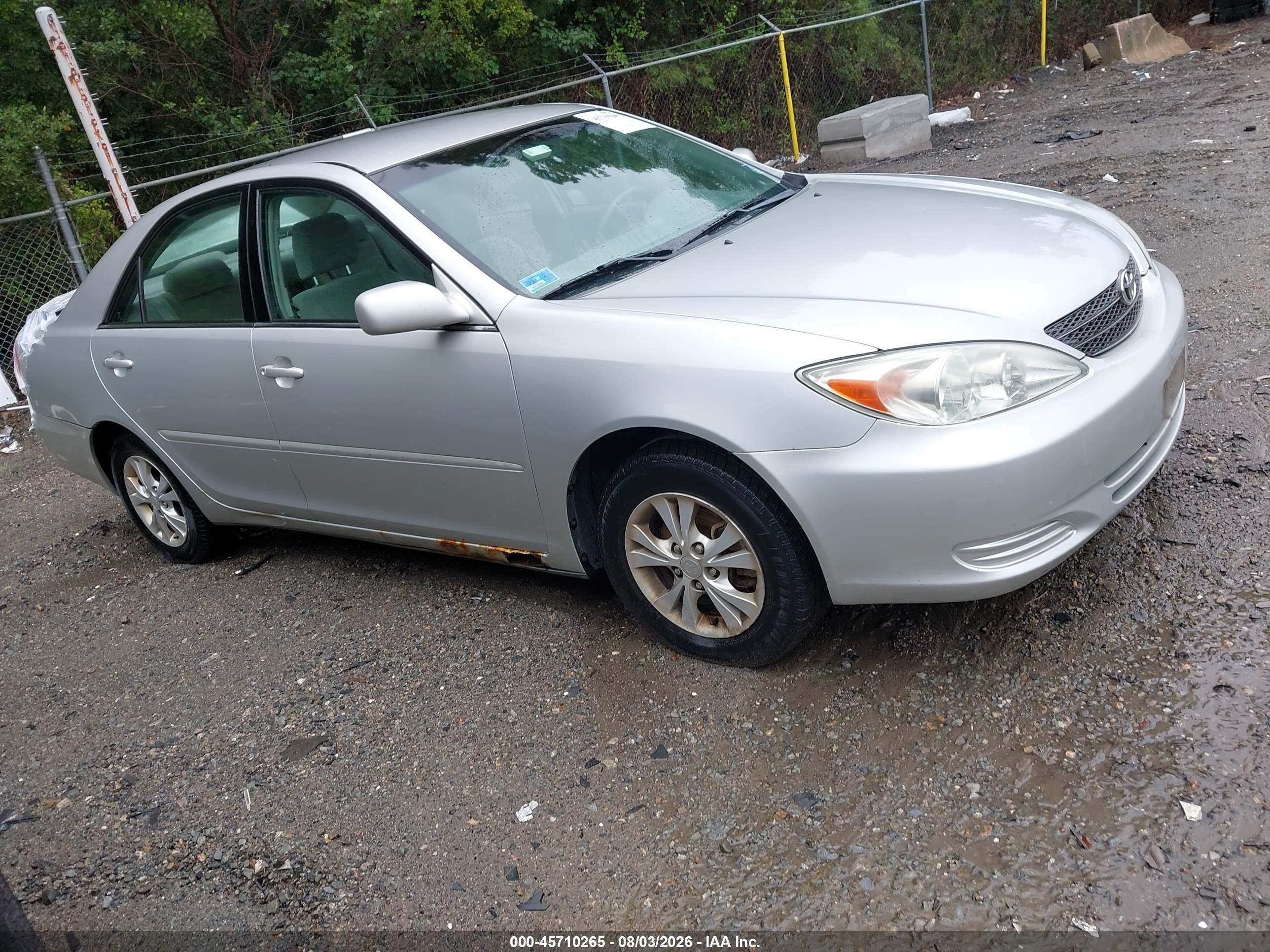 2004 Toyota Camry LE, VIN 4T1BF32K84U067902 — Rear end