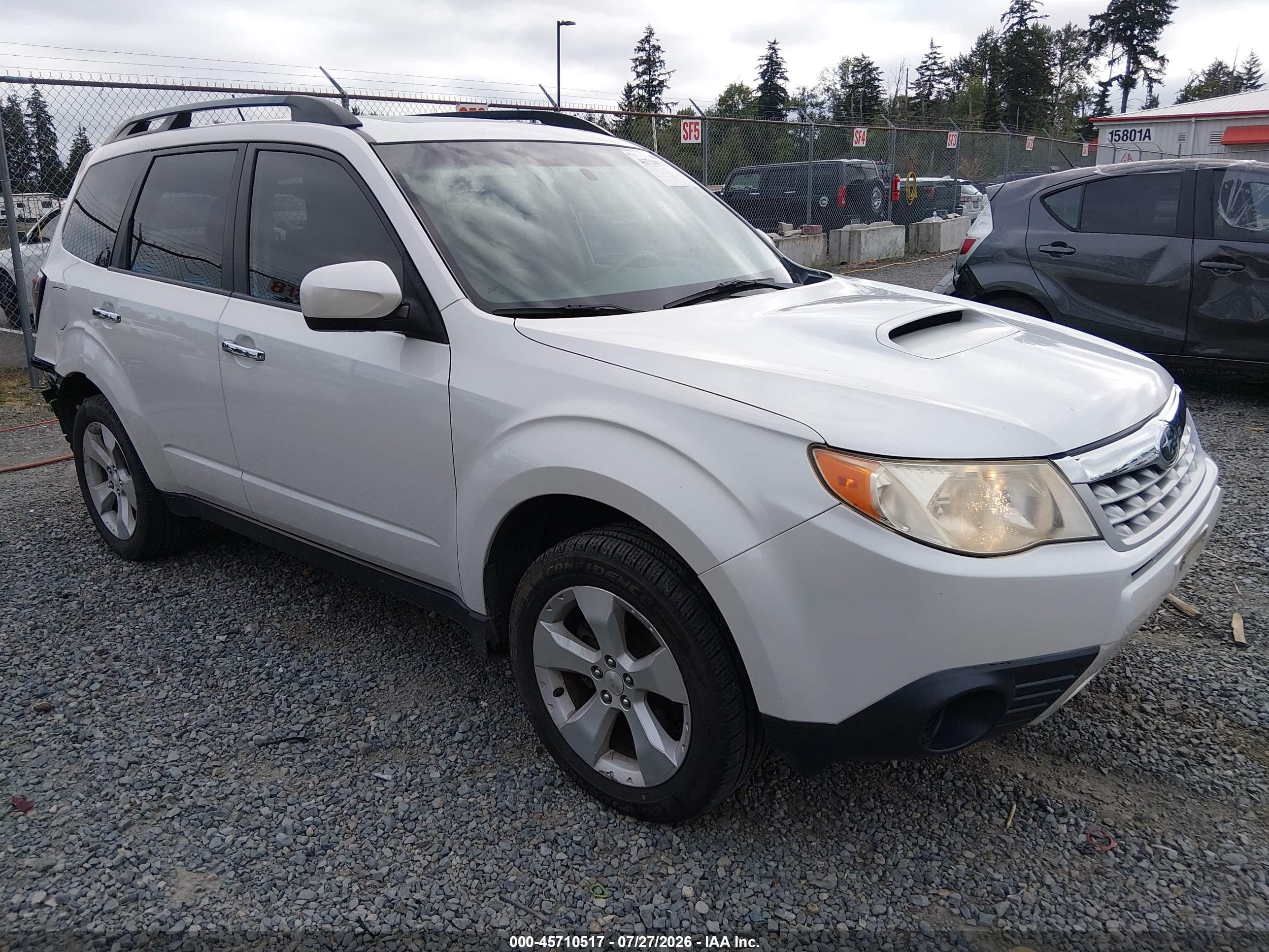 2011 Subaru Forester XT Premium, VIN JF2SHGAC5BH729216 — Rear end