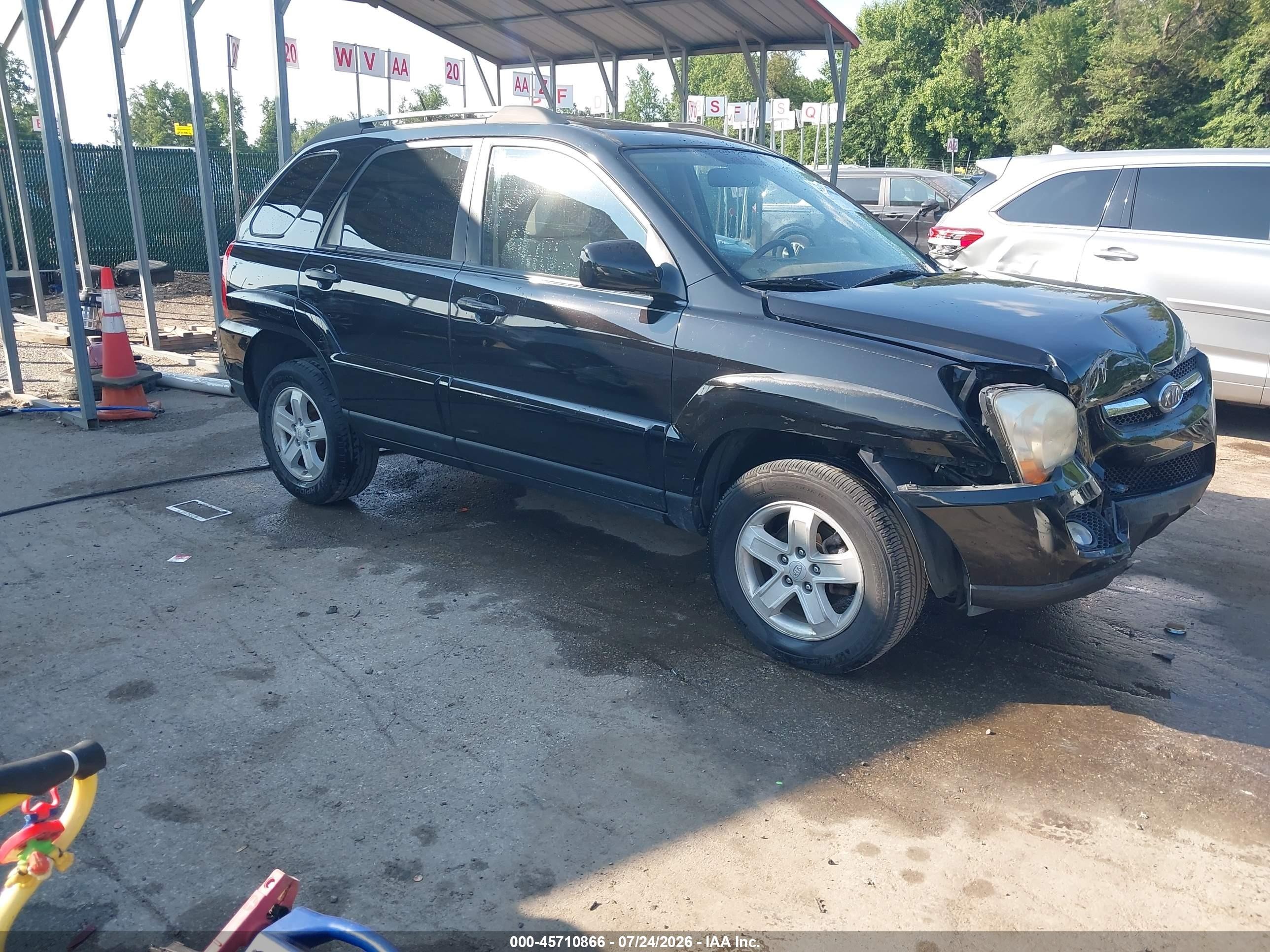 2009 Kia Sportage EX, VIN KNDJF723X97628459 — Front end