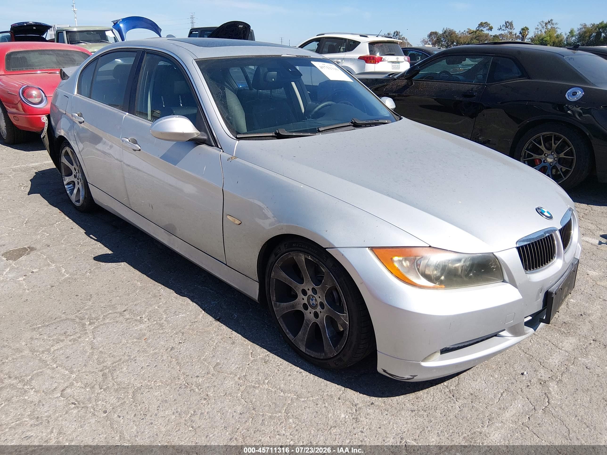 2007 BMW 3 Series 335i, VIN WBAVB73527KY60803 — Зад