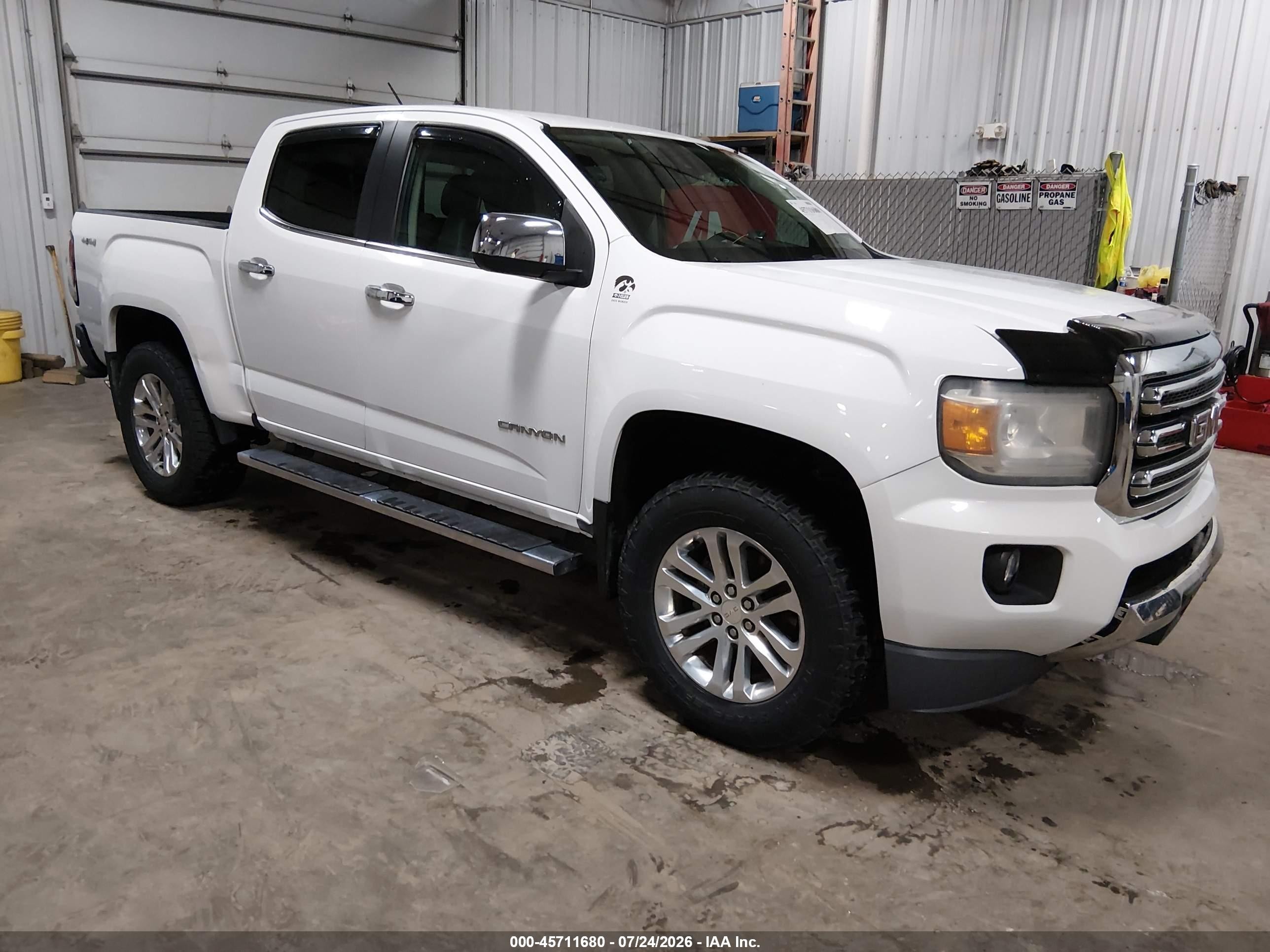 2016 GMC Canyon 4WD SLT, VIN 1GTG6DE36G1196232 — Hail