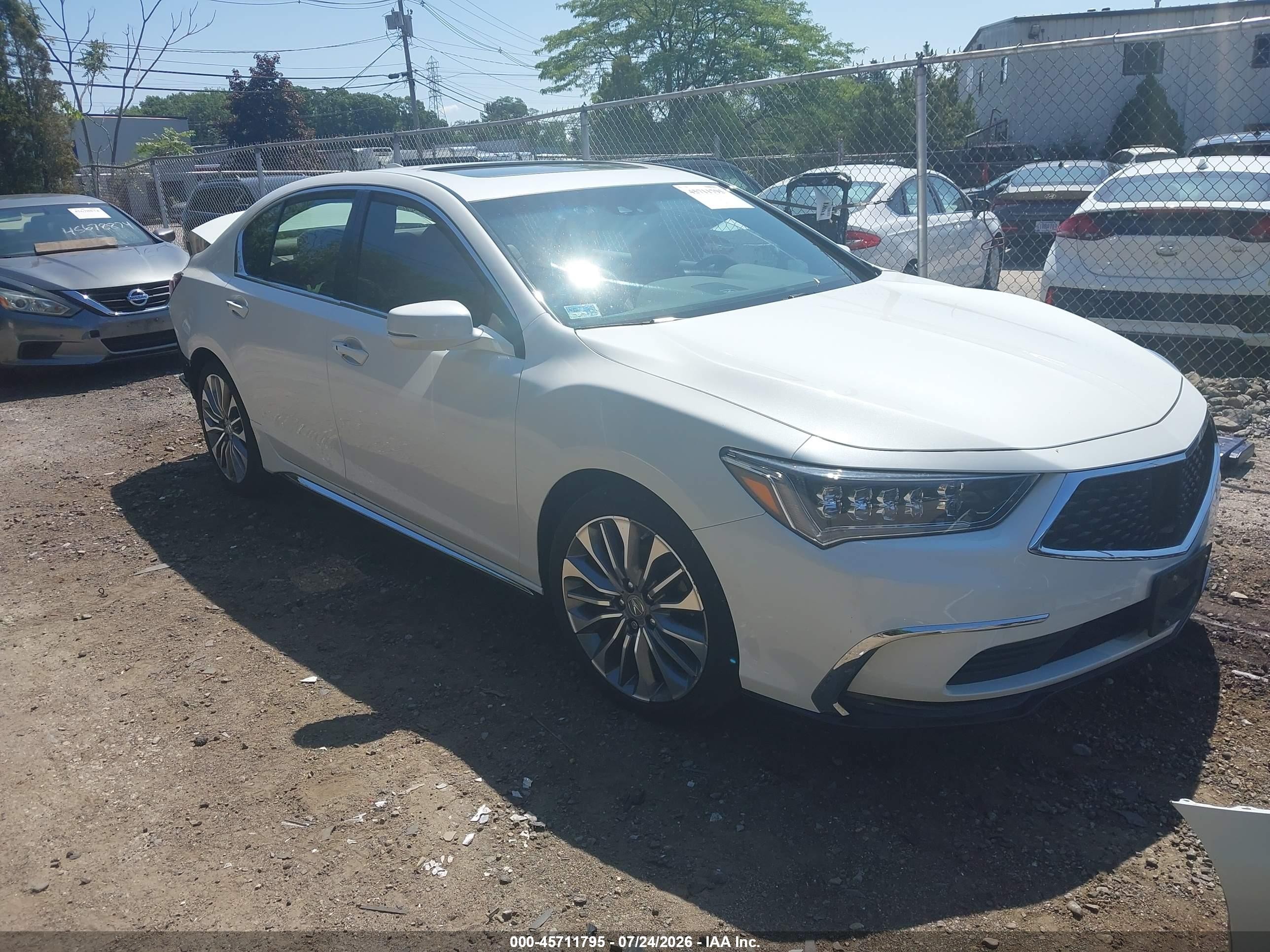 2018 Acura RLX Technology, VIN JH4KC1F50JC000216 — Rear end