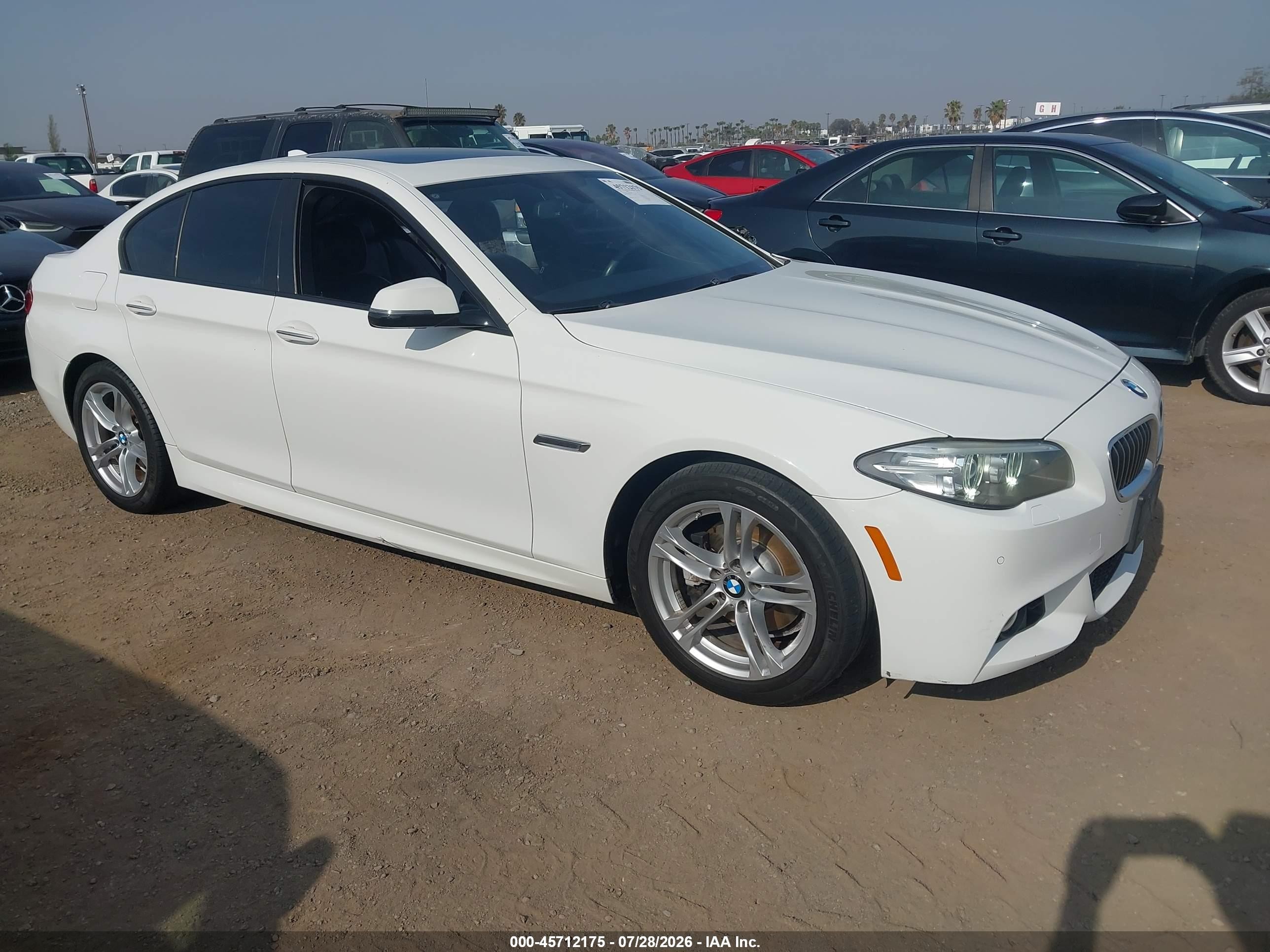 2016 BMW 5 Series 528i, VIN WBA5A5C55GD526907 — Side