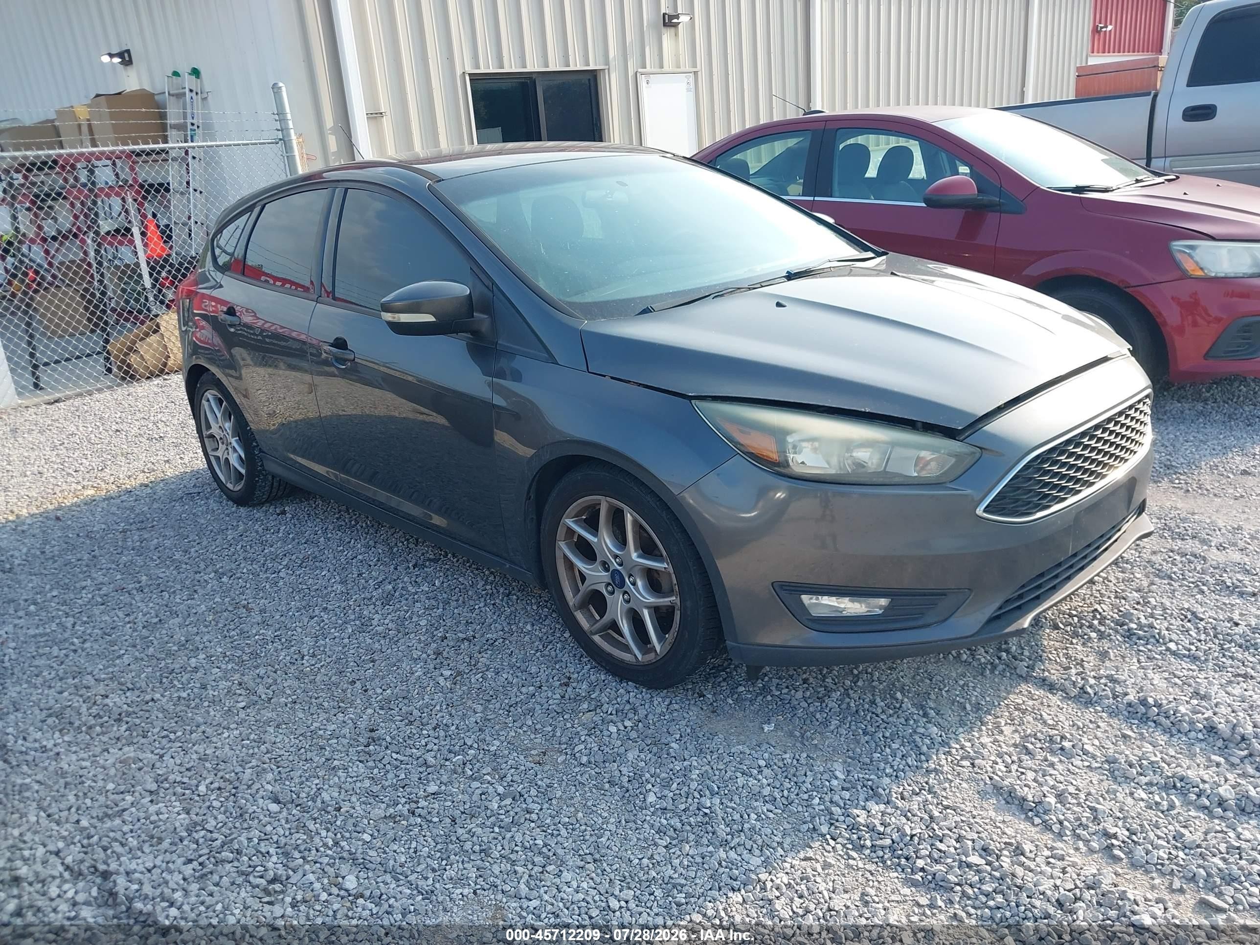 2015 Ford Focus SE, VIN 1FADP3K28FL235112 — Normal wear