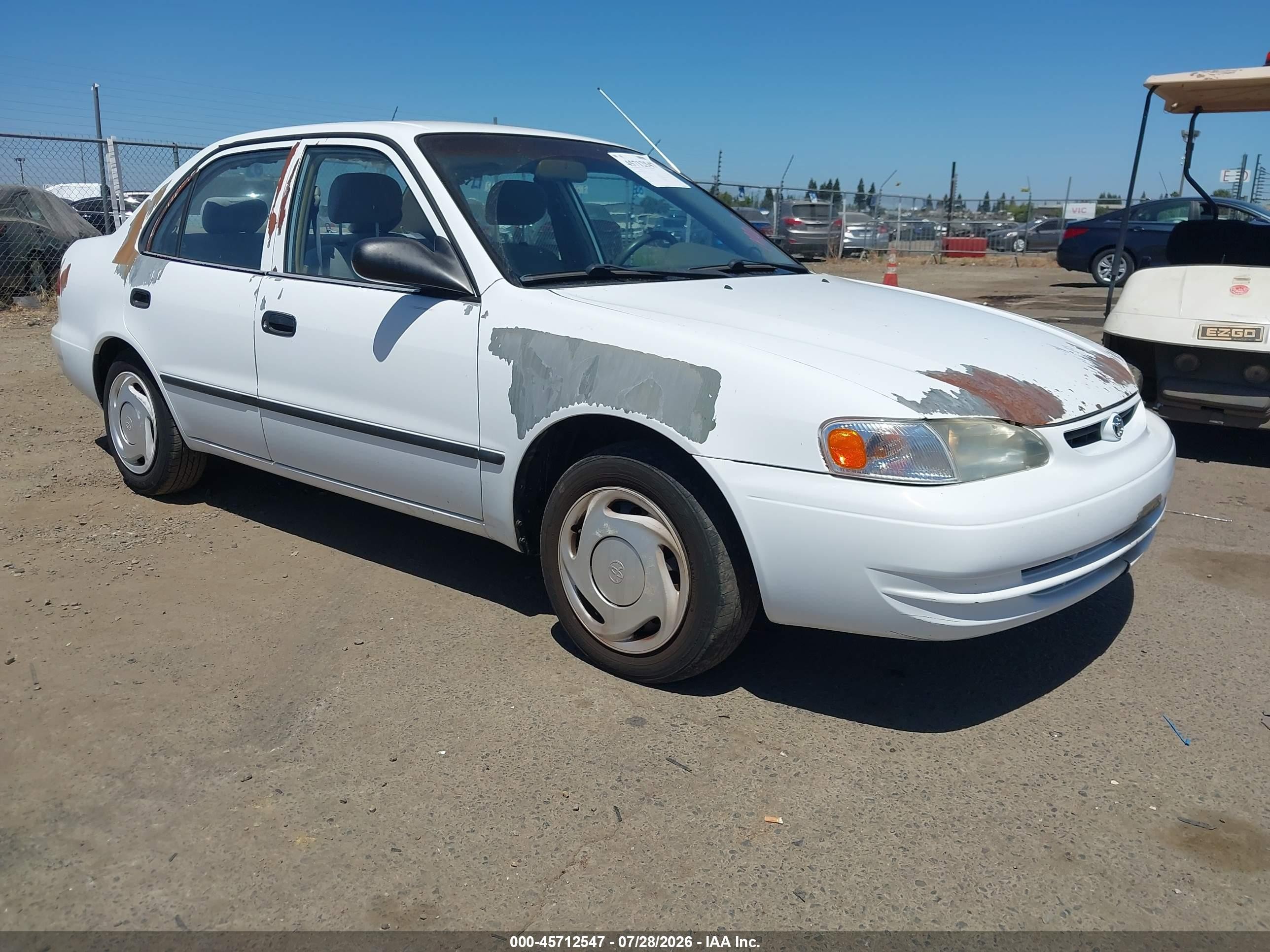 1998 Toyota Corolla VE, VIN 1NXBR12E7WZ120999 — Normal wear