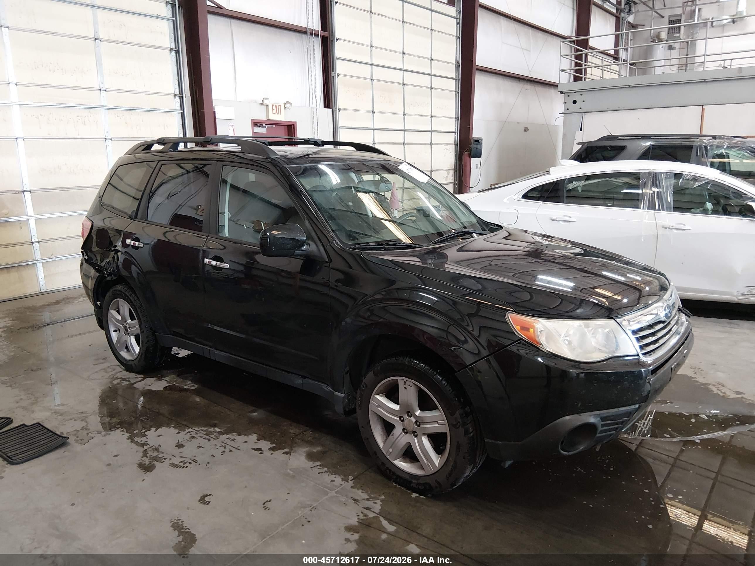 2009 Subaru Forester X, VIN JF2SH63689H709215 — Зад